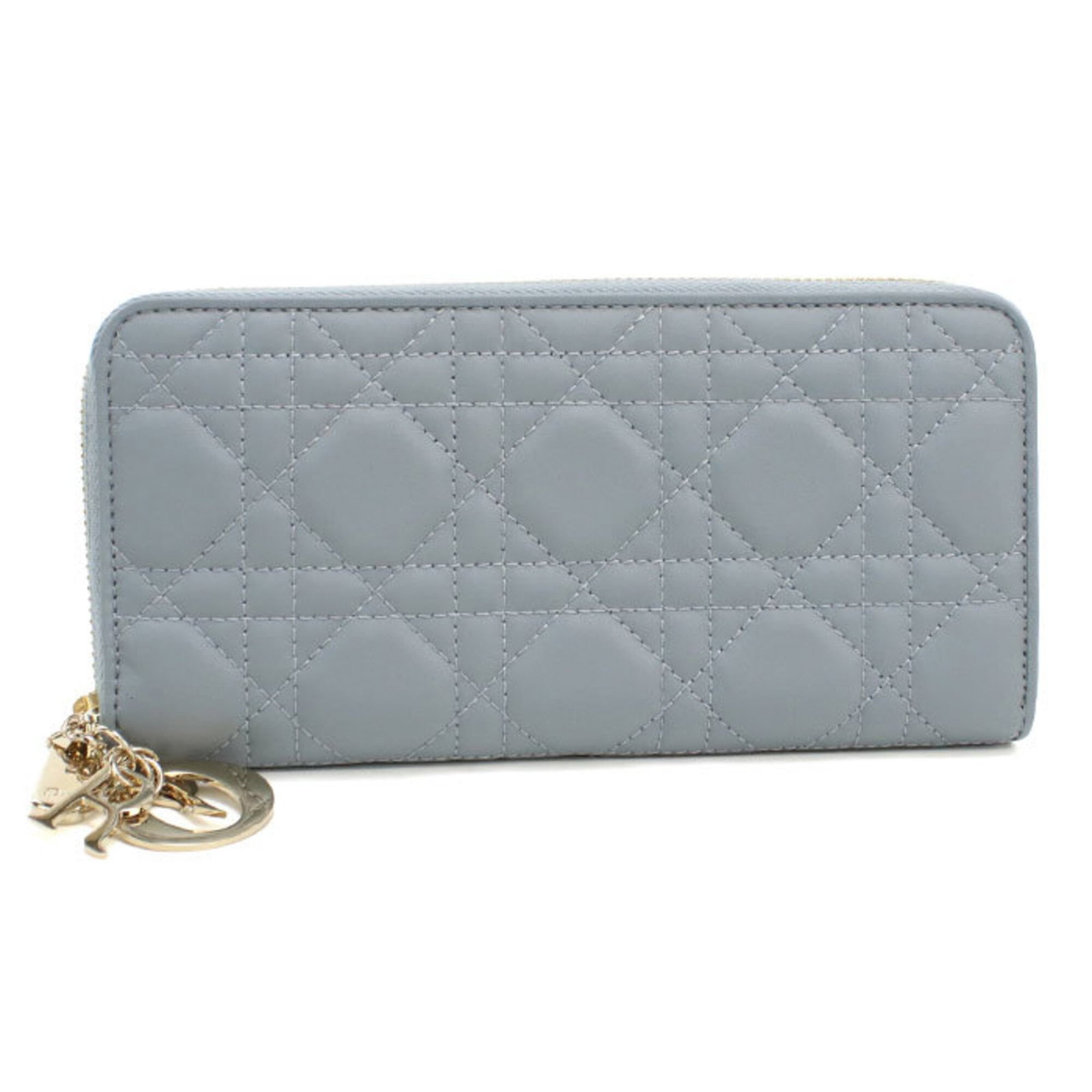 Long Leather Christian Dior Bi Fold Wallet: Long Leather Christian Dior Bi Fold Wallet This luxurious Long Leather Christian Dior Bi Fold Wallet is crafted from high-quality lambskin leather, featuring a sleek blue color and classic design.