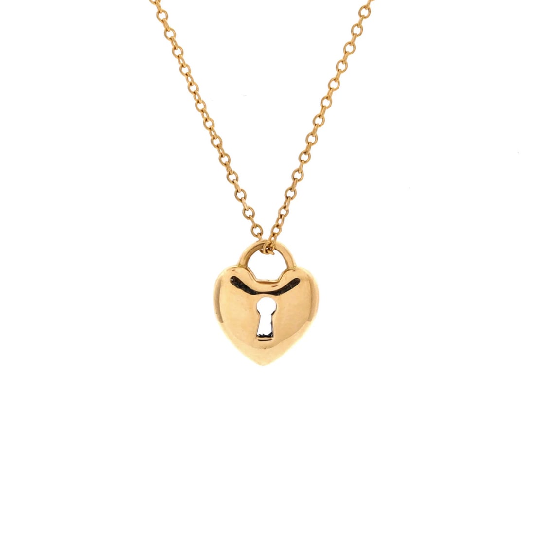 Heart Lock Pendant Necklace 18K Yellow Gold Tiffany: Heart Lock Pendant Necklace 18K Yellow Gold Tiffany 18K Yellow Gold Tiffany & Co. Heart Lock Pendant Necklace measures 16 inches in length, featuring a 11.35mm x 9.35mm pendant. This beautiful necklac