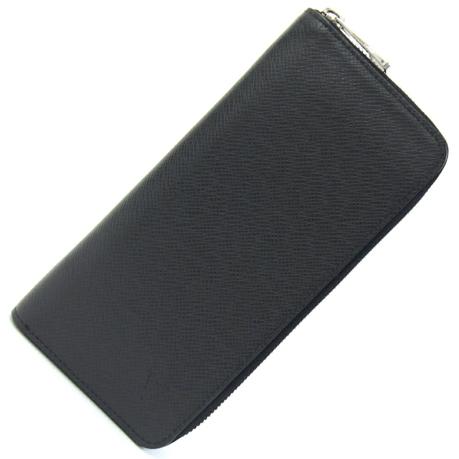 Vuitton Long Wallet Bi Fold Taiga Leather: Vuitton Long Wallet Bi Fold Taiga Leather Taiga leather construction provides a durable and stylish foundation for this bi-fold long wallet, measuring 20cm x 10cm x 2cm. The sleek black design