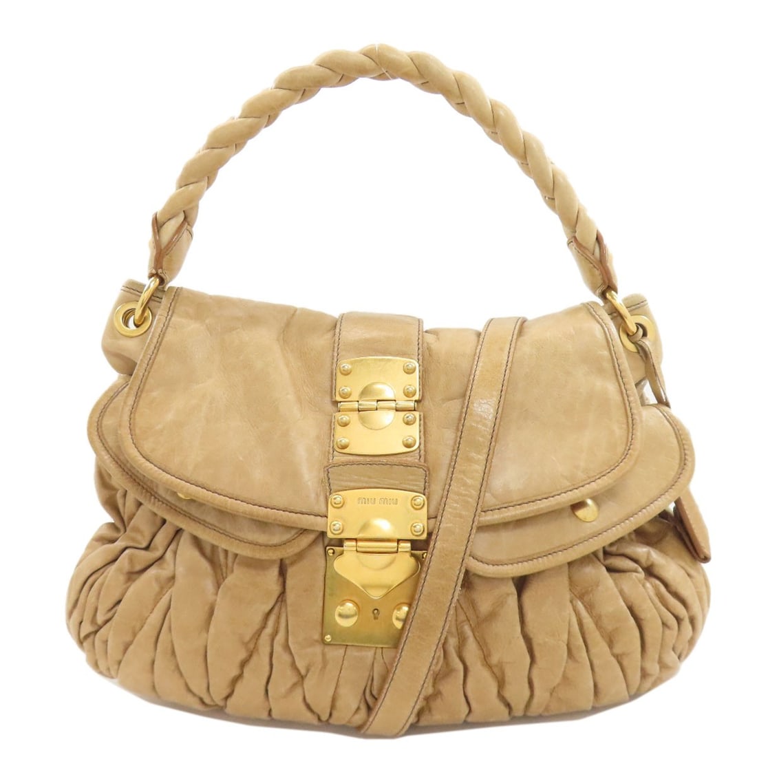 Miumiu 2Way Tote Bag Leather: Miumiu 2Way Tote Bag Leather Beige leather tote bag with a classic 2-way design, perfect for everyday use. Made from high-quality leather, this stylish bag features a timeless aesthetic that