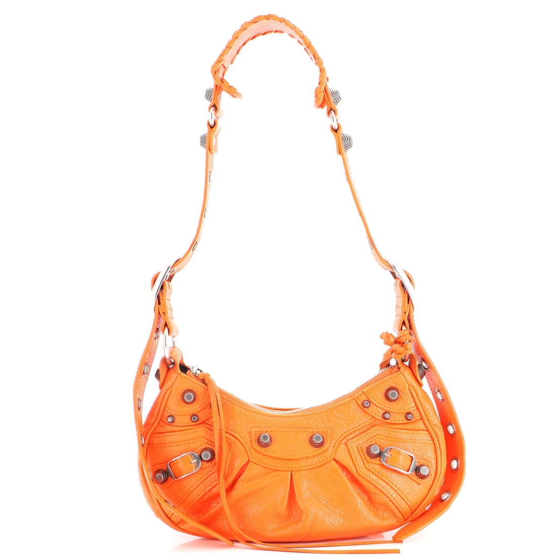 Giant Studs Leather Bag XS Balenciaga Le Cagole: Giant Studs Leather Bag XS Balenciaga Le Cagole Orange Balenciaga Le Cagole Giant Studs Leather Bag in XS size, featuring giant studs and a bold exterior color, is a statement piece. The bag comes