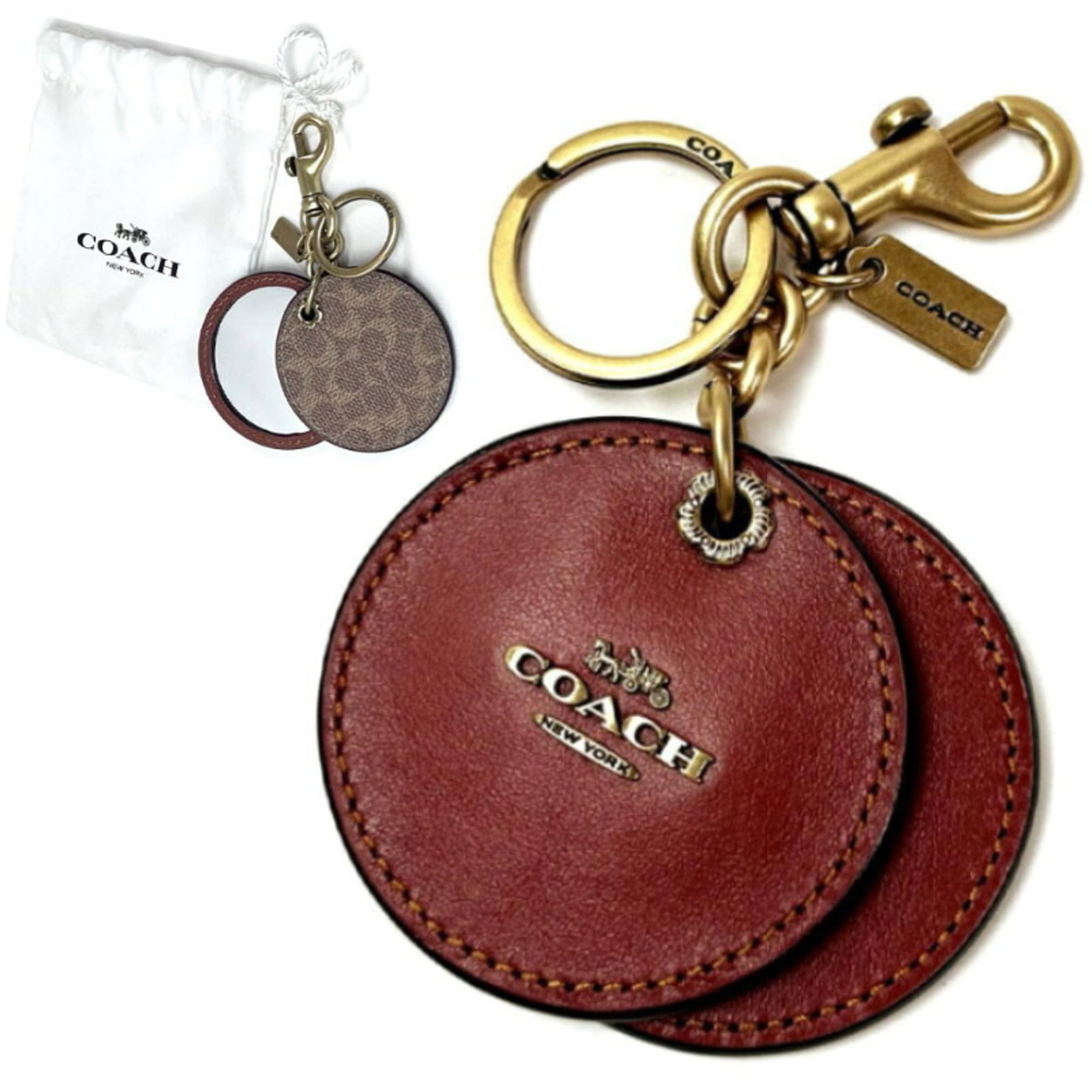 Keyring Leather Coach: Keyring Leather Coach This brown leather keyring from Coach features a classic design with a simple, elegant shape. Measuring 13cm x 6.6cm x 1cm, it's a compact accessory that can be easily attached