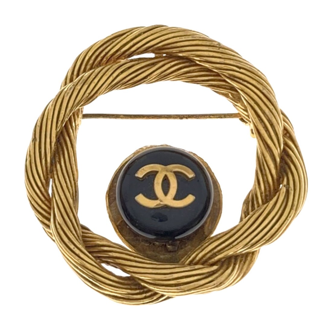 Metal Coco Brooch Chanel Mark: Metal Coco Brooch Chanel Mark Metal Coco Brooch Chanel Mark is a gold metal brooch featuring a Coco Brooch design. It bears a signature, and its gold exterior color adds a touch of luxury to any outfi