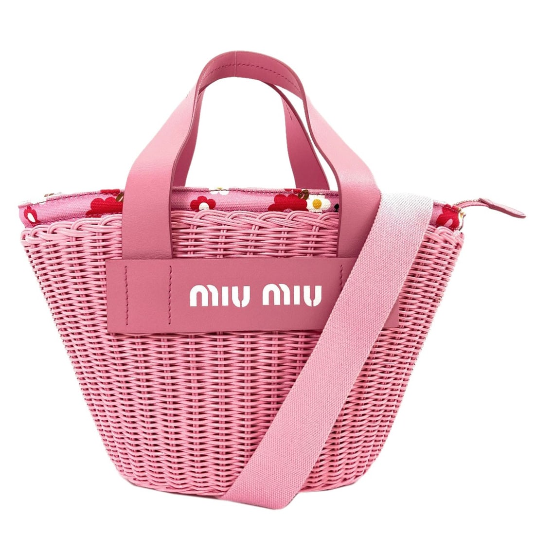 Handbag Rattan 2Way Miumiu: Handbag Rattan 2Way Miumiu Pink Rattan Handbag with 2Way Design. This MIUMIU handbag features a unique rattan exterior in a vibrant pink color, showcasing a 2Way design that adds a touch of style to
