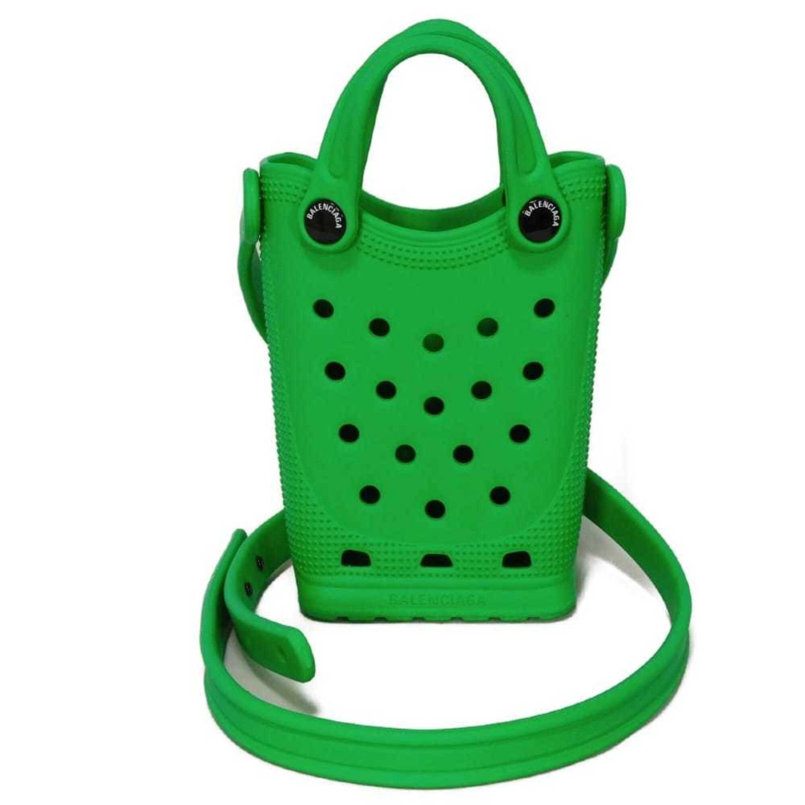Rubber shoulder bag pochette by Balenciaga: Rubber shoulder bag pochette by Balenciaga The Balenciaga rubber pochette boasts a striking green hue and sleek, modern design. Made from high-quality rubber, this shoulder bag features a compact