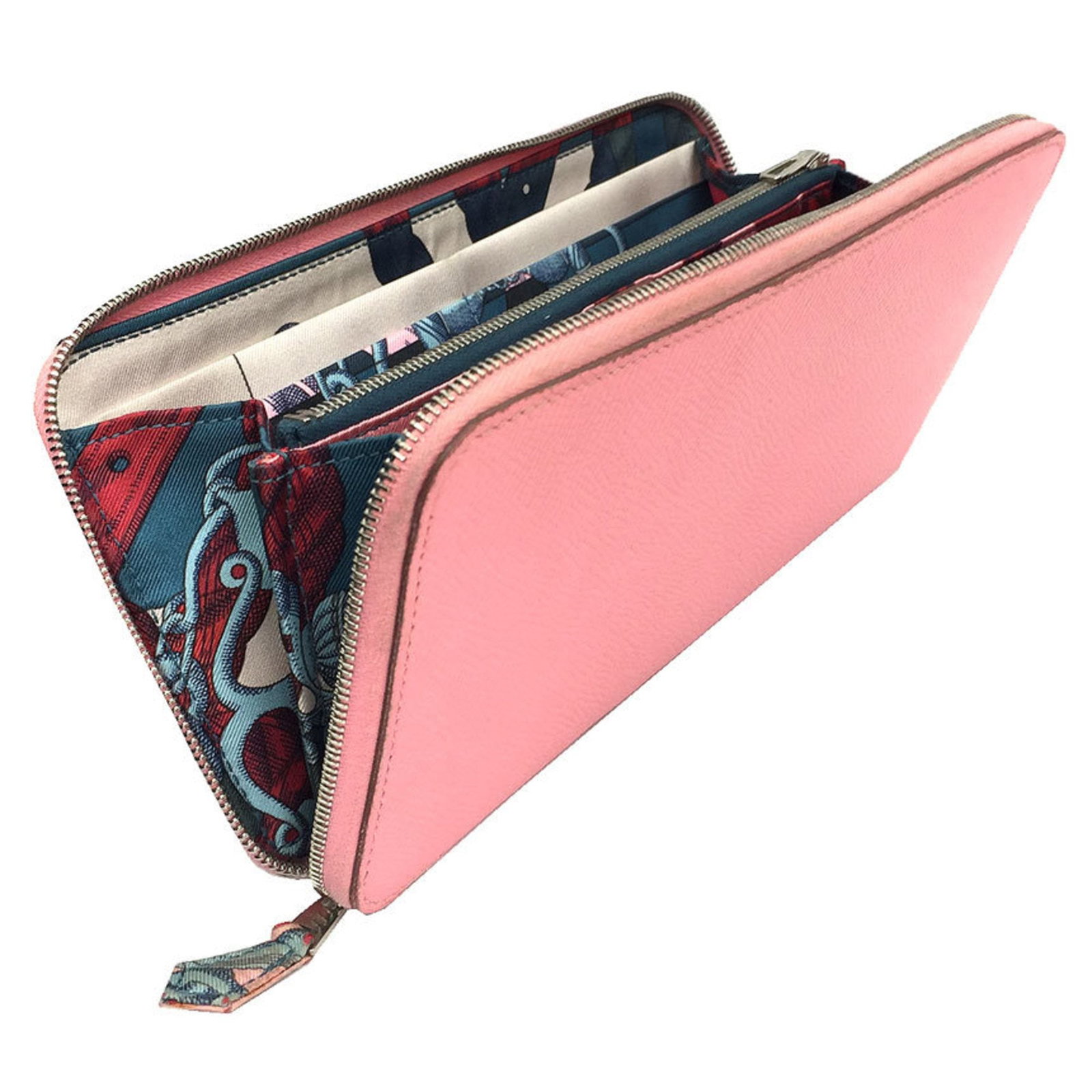 Epsom Leather Bi fold Wallet Hermes: Epsom Leather Bi fold Wallet Hermes Epsom Leather Bi Fold Wallet by Hermes, a stylish and elegant accessory in a beautiful pink, rose confetti hue. This long wallet features high-quality Epsom