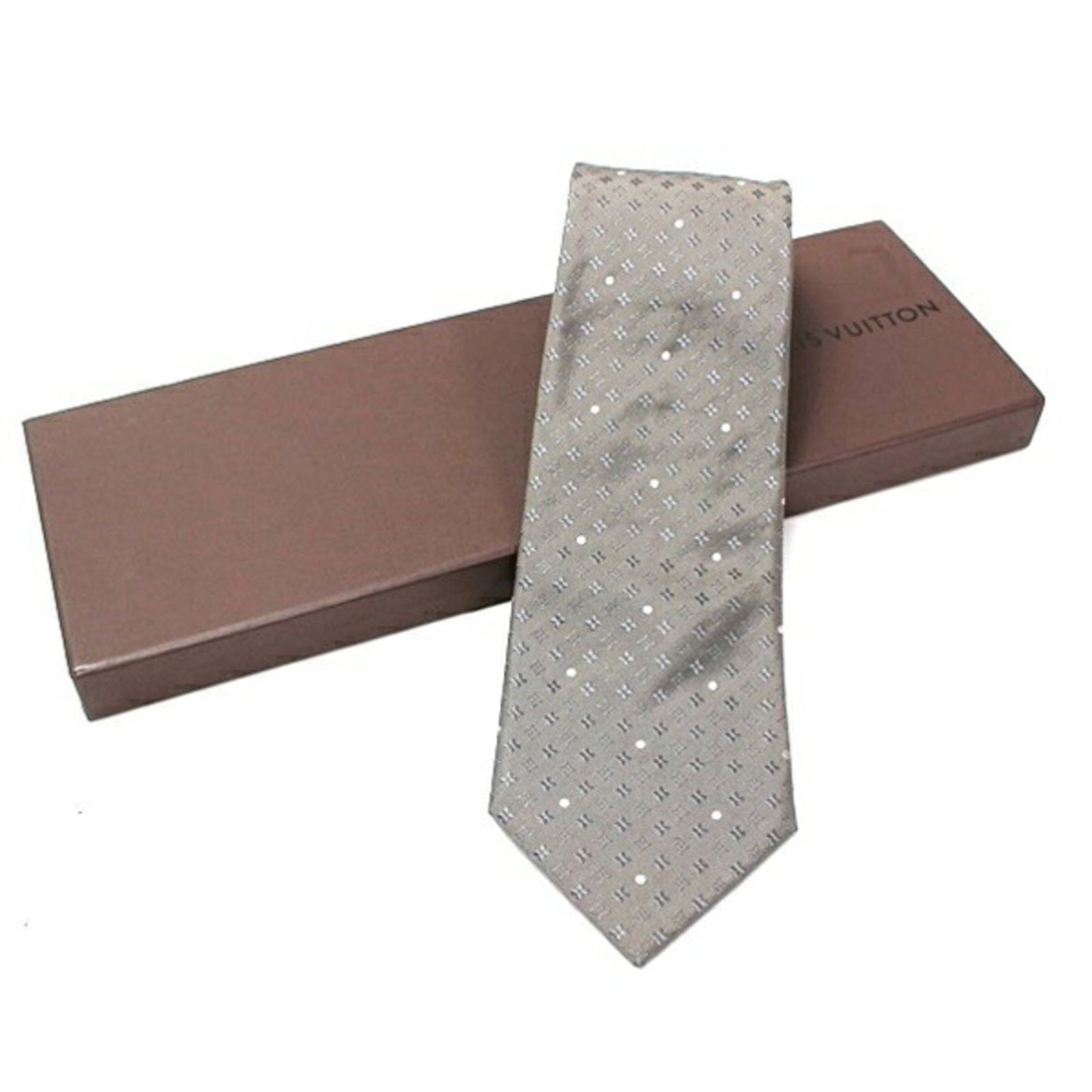 Vuitton Cravat Silk Louis: Vuitton Cravat Silk Louis Silk cravat from Louis Vuitton, featuring a gray color and a width of 9.5cm. Made from high-quality silk, this cravat is a stylish accessory for formal occasions. The cravat