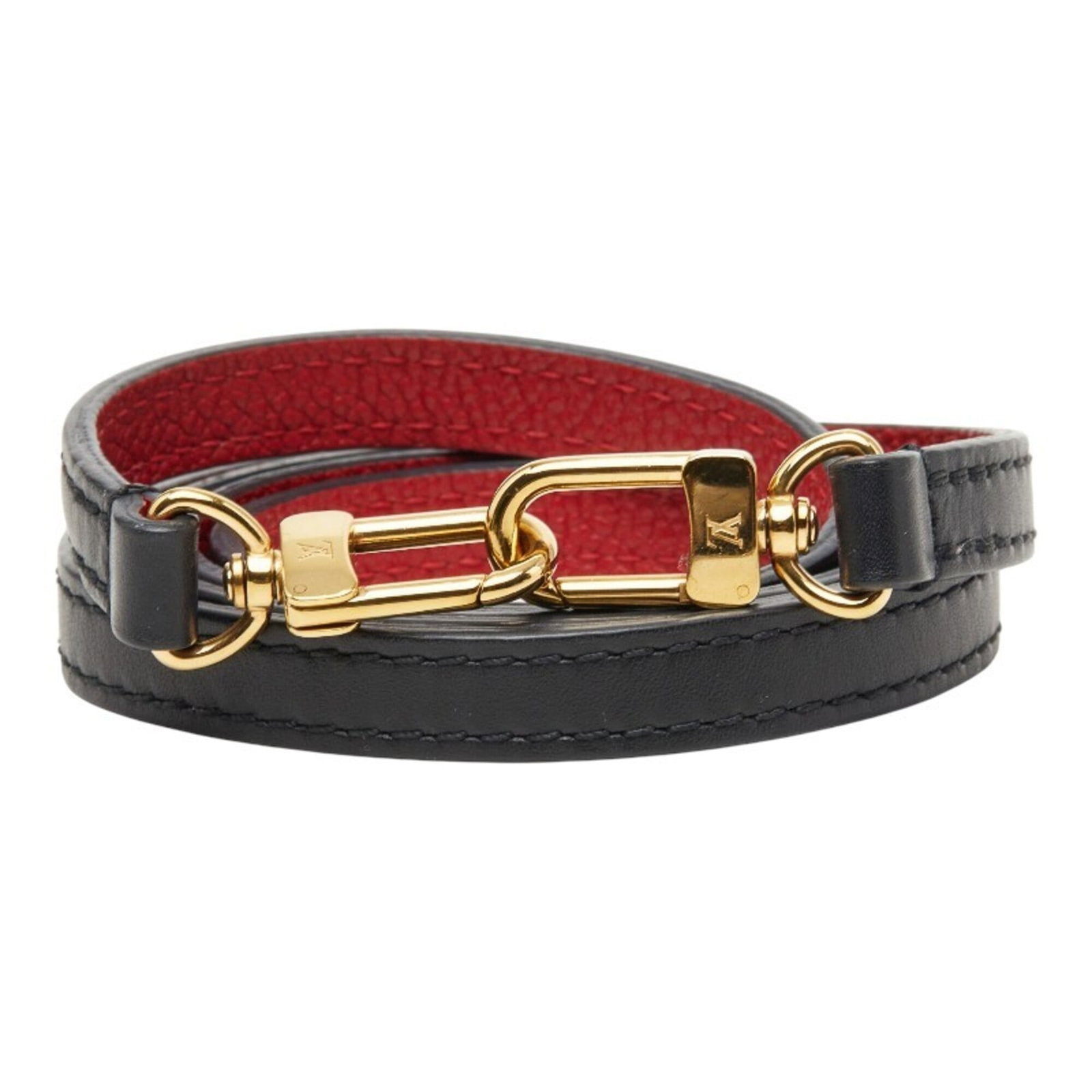 Leather Strap Louis Vuitton: Leather Strap Louis Vuitton Navy leather strap from Louis Vuitton, measuring 112cm x 1cm x 0.39'' in size. This strap bears a signature and is made from high-quality leather, characteristic of the bra
