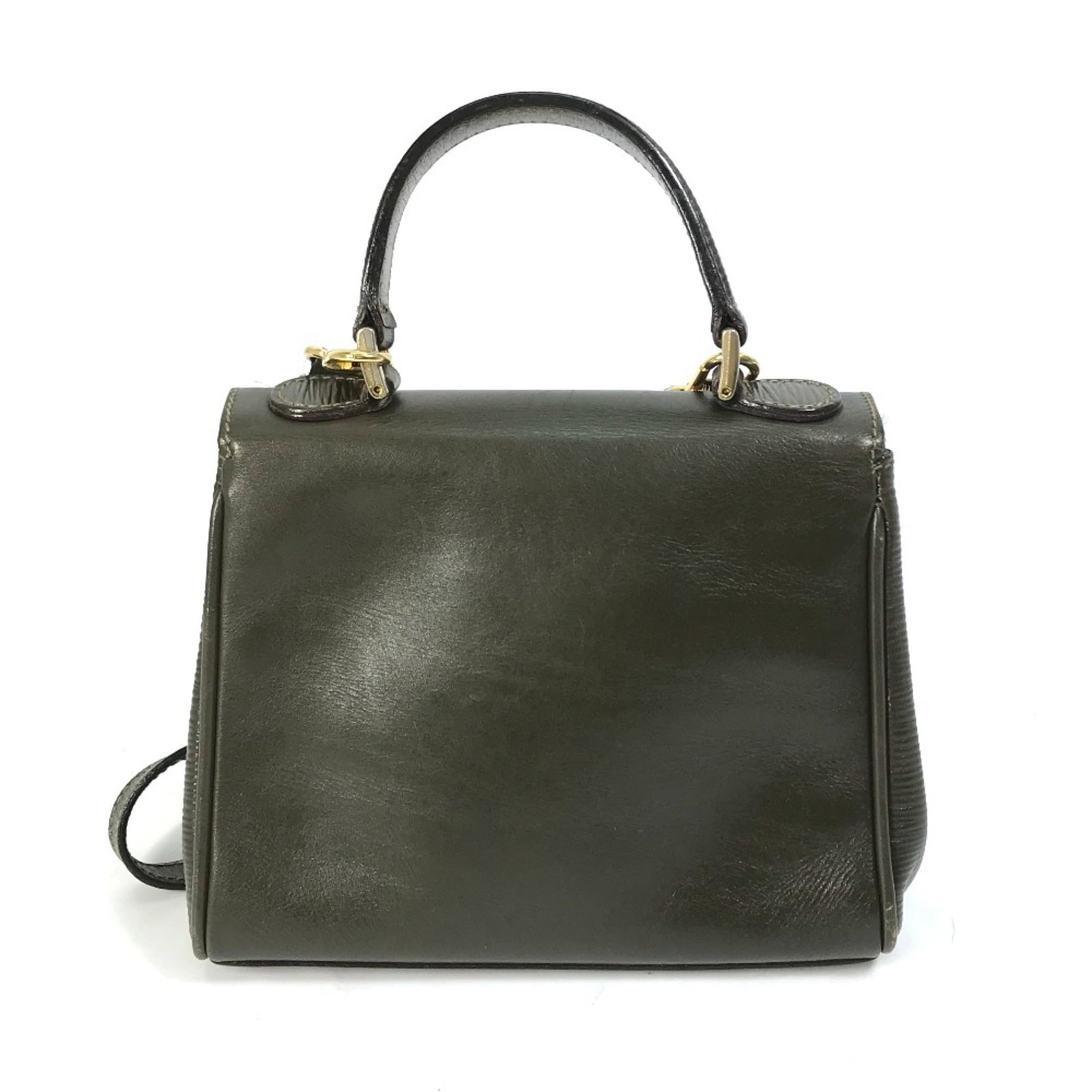 Shoulder Bag Leather Fendi Handbag: Shoulder Bag Leather Fendi Handbag This khaki leather shoulder bag from Fendi features a classic design with clean lines and a timeless aesthetic. Made from high-quality leather, the bag measures