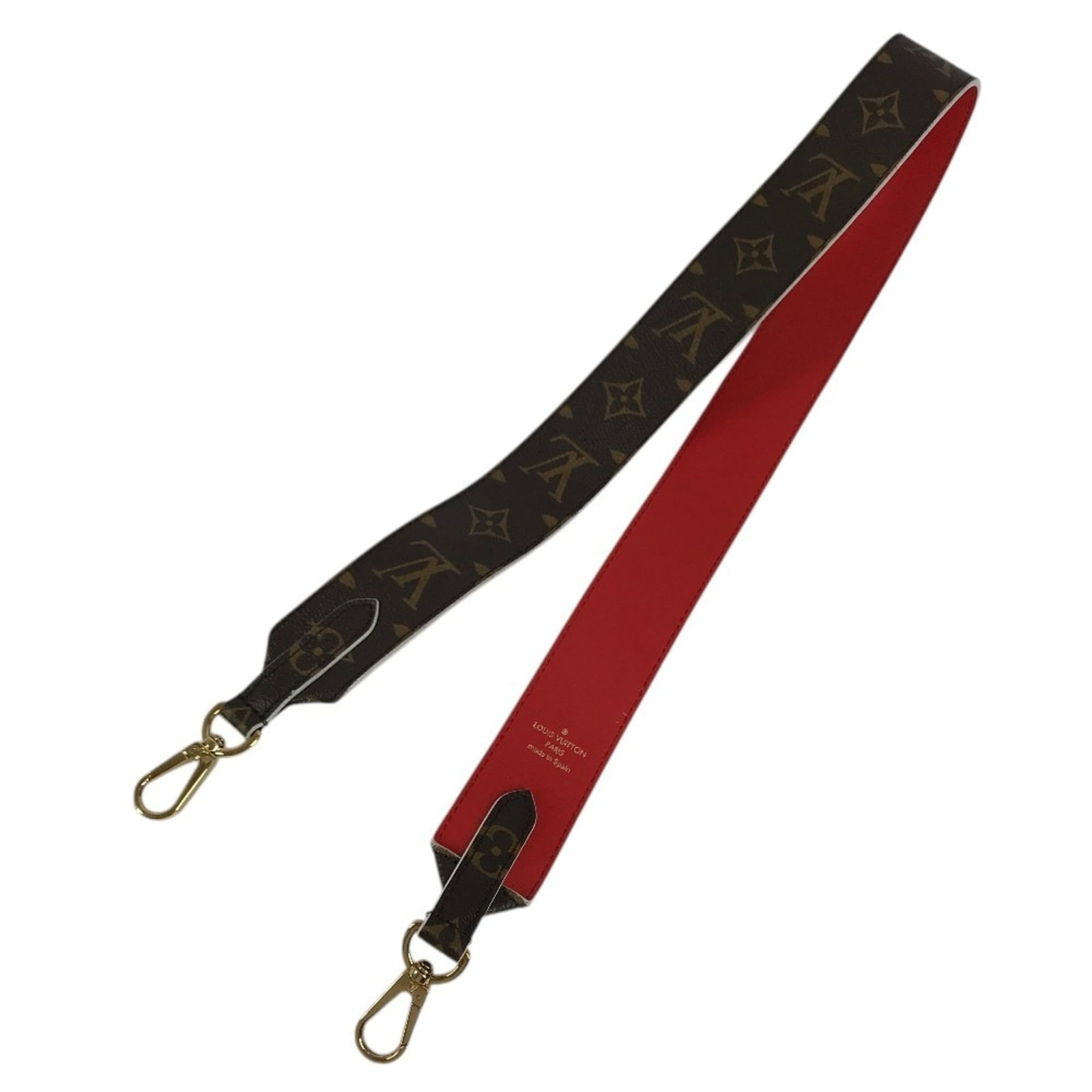 Monogram Strap Louis Vuitton: Monogram Strap Louis Vuitton Monogram Strap from Louis Vuitton features a classic design with a brown and red color combination, showcasing the iconic monogram pattern. Made from high-quality