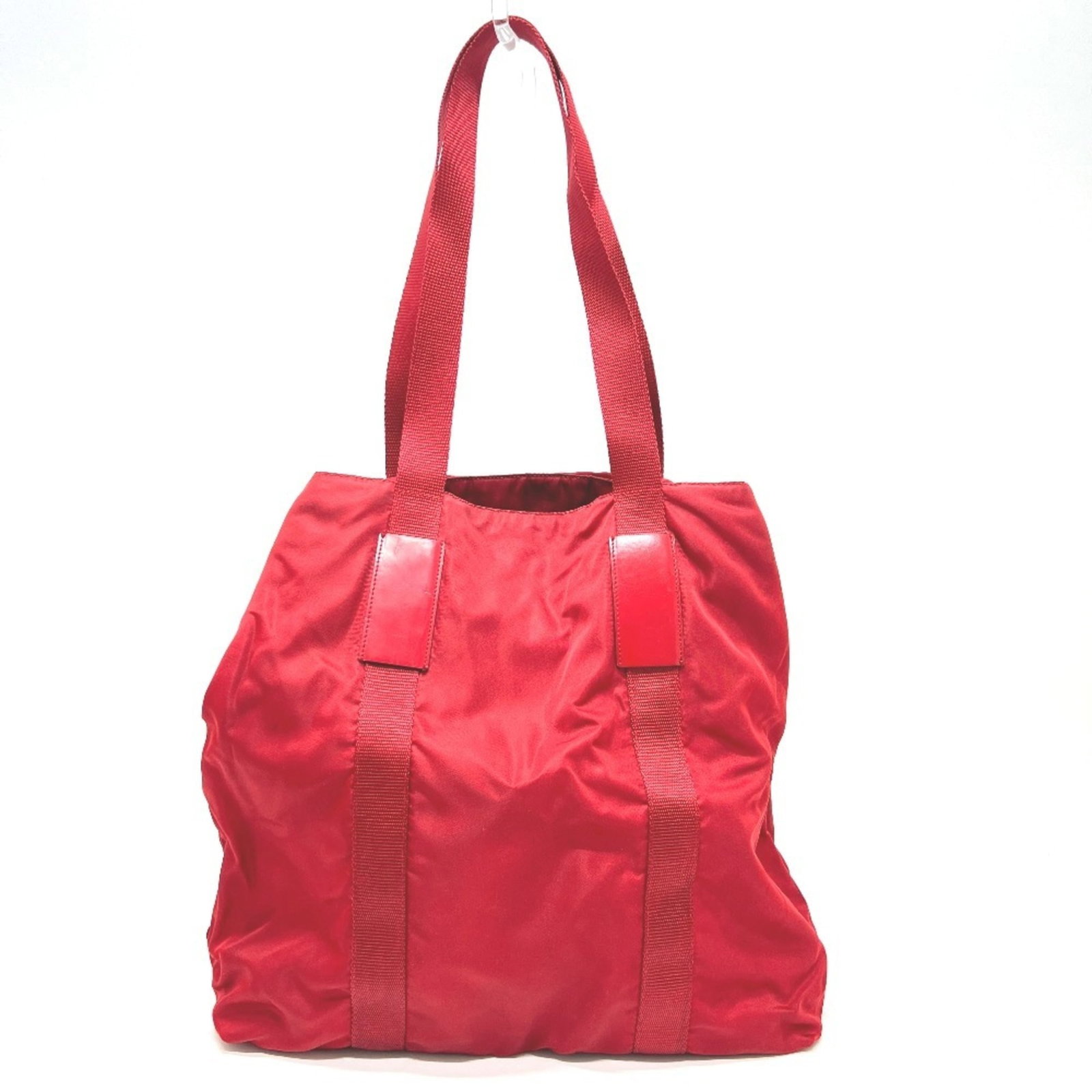 Tote Nylon Prada Handbag: Tote Nylon Prada Handbag Tote Nylon Prada Handbag in Red - A stylish and functional bag made from high-quality nylon, this Prada tote measures 38cm x 35cm x 12.5cm and features a bold red color. With