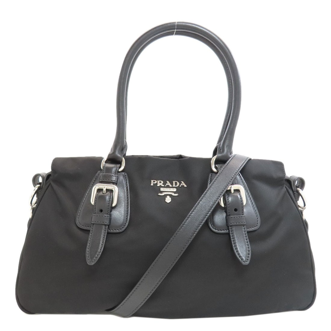 Prada 1Ba021 Logo Hardware 2Way Tote Bag Nylon: Prada 1Ba021 Logo Hardware 2Way Tote Bag Nylon The Prada 1Ba021 Logo Hardware 2Way Tote Bag Nylon is a sleek and versatile tote bag with a black exterior and nylon material. Featuring a distinctive lo