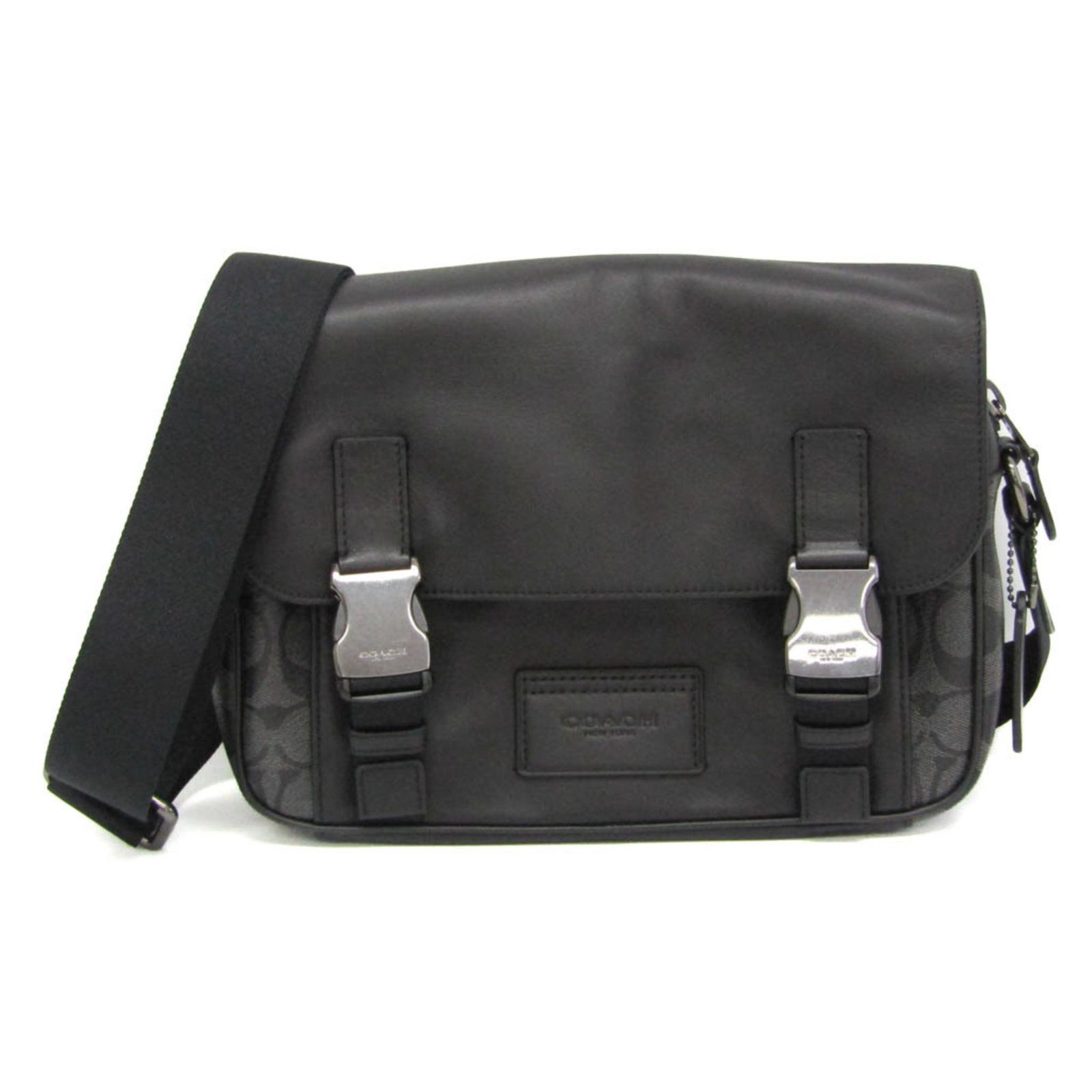 Coach PVC Leather Shoulder Bag: Coach PVC Leather Shoulder Bag Black PVC Leather Shoulder Bag with a sleek design, featuring a signature on the exterior. Made from high-quality materials, this Coach shoulder bag measures 17.5cm x 27