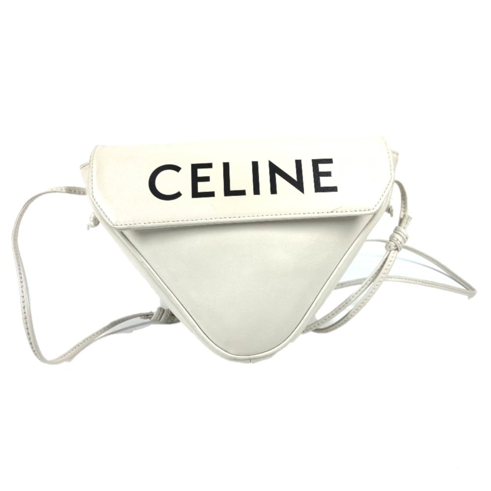 Celine Leather Shoulder Bag Pochette: Celine Leather Shoulder Bag Pochette Black and White Celine Leather Pochette. Made from high-quality leather, this pochette features a sleek design with a magnetic closure. Perfectly sized for daily
