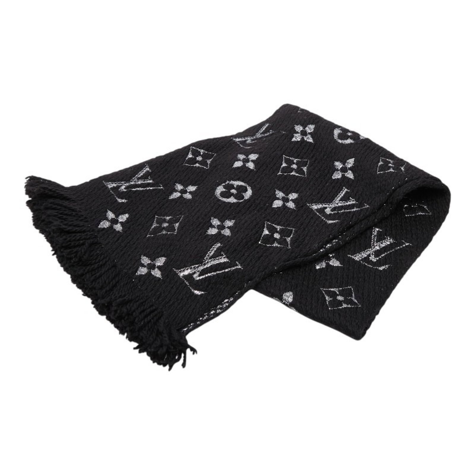 Silk Wool Stole Louis Vuitton: Silk Wool Stole Louis Vuitton Silk and wool blend in a luxurious black Louis Vuitton stole, measuring 1.65m x 31cm. The stole's elegant design and high-quality materials make it a stylish accessory