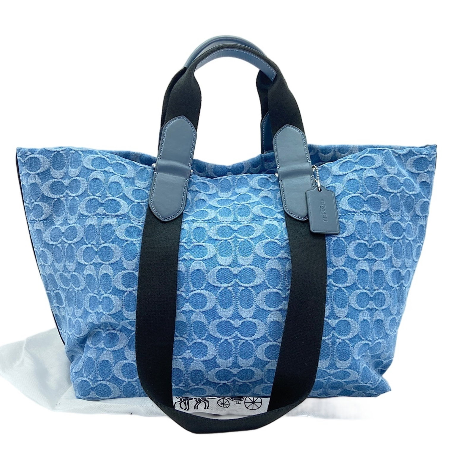 Bag Tote Coach: Bag Tote Coach Blue Coach Country of Origin: USA, this 30cm x 34cm x 20cm tote bag features a stylish design. The bag's blue color and classic style make it a versatile accessory for everyday use.