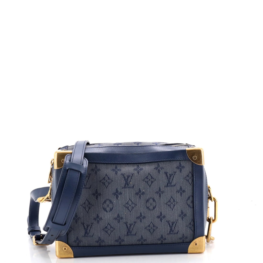 Soft trunk bag Monogram denim Louis Vuitton: Soft trunk bag Monogram denim Louis Vuitton Soft trunk bag with a unique monogram denim design, featuring blue exterior and interior, and aged gold hardware. The bag has a distinctive blue color and