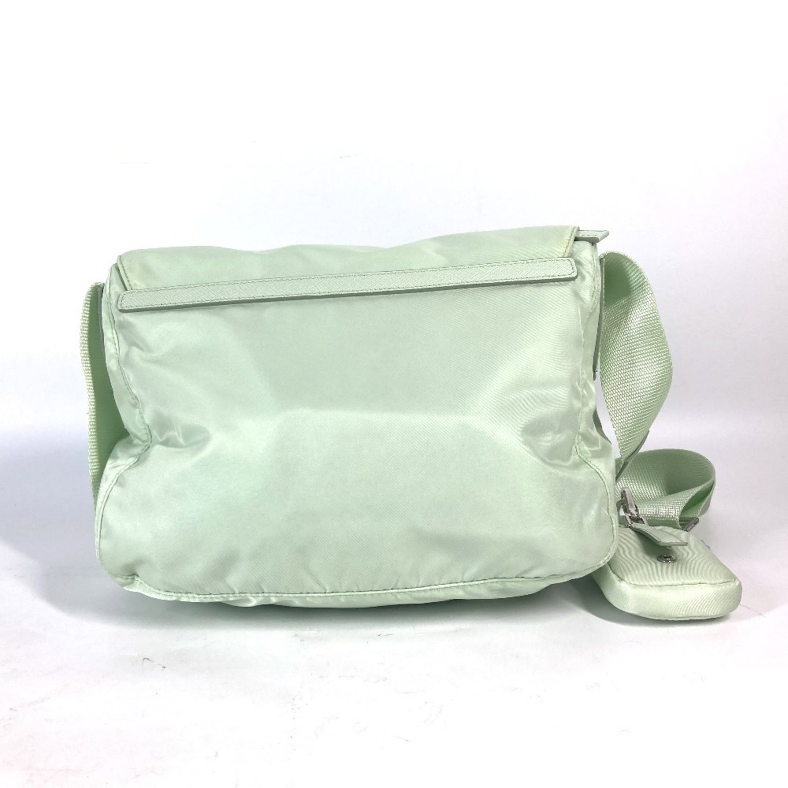 Shoulder Bag Nylon: Shoulder Bag Nylon Green Prada Nylon Shoulder Bag with Dust Bag. This 20.5cm x 26cm x 11cm shoulder bag is made from nylon and comes with a dust bag for protection. The bag's green color makes it a