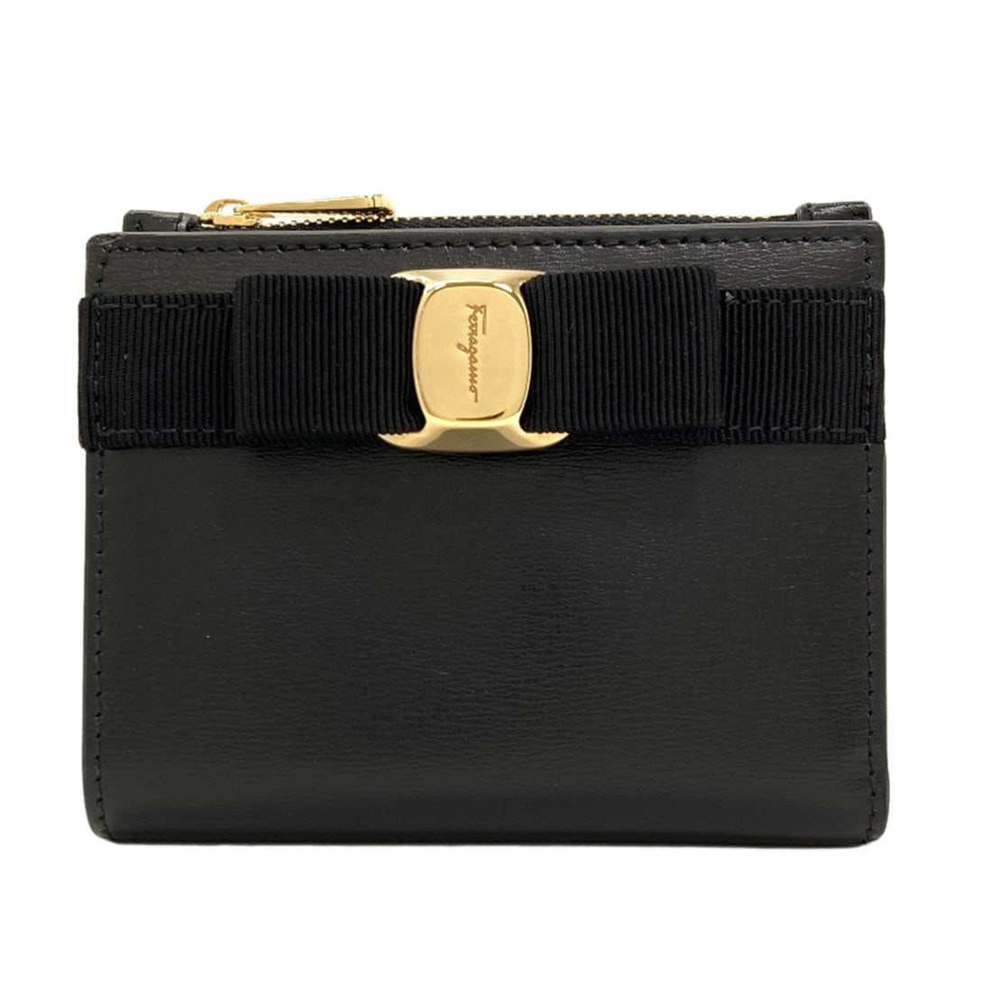 Vara Ribbon Leather Wallet Coin Bifold With Ferragamo Salvatore: Vara Ribbon Leather Wallet Coin Bifold With Ferragamo Salvatore Black leather bifold wallet with a coin pocket, designed by Salvatore Ferragamo, features a classic and timeless design. The wallet's si