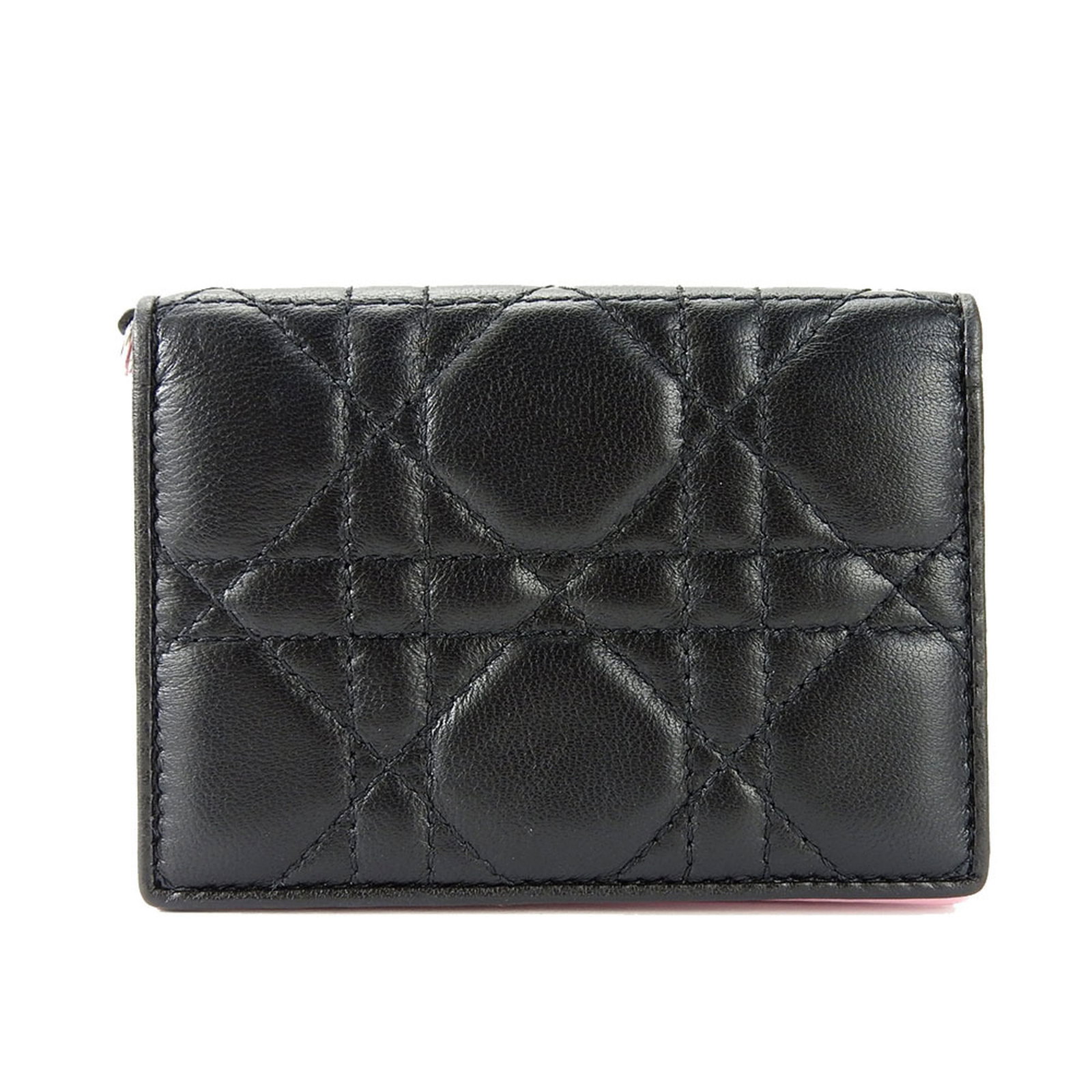 Leather Christian Dior Business Card Case: Leather Christian Dior Business Card Case Black or Pink Leather Business Card Case by Christian Dior. Made from high-quality leather, this compact case measures 7.5cm x 10.5cm x 1.5cm and weighs 44g.