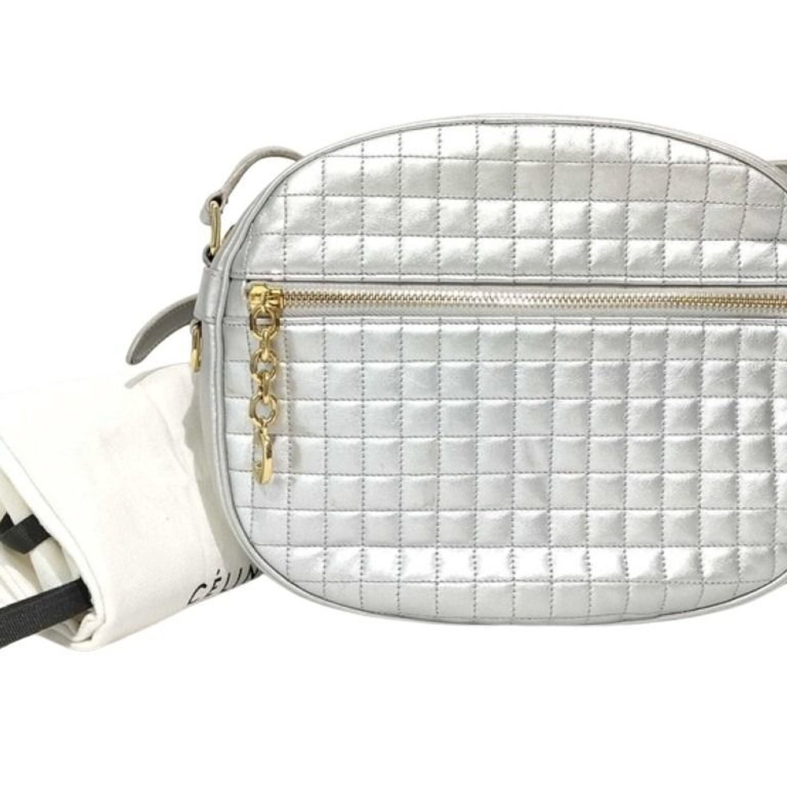 Shoulder Bag Leather Celine: Shoulder Bag Leather Celine This luxurious shoulder bag is crafted from high-quality leather, featuring a sleek silver color that adds a touch of sophistication to any outfit. Measuring 19.5cm x 24cm