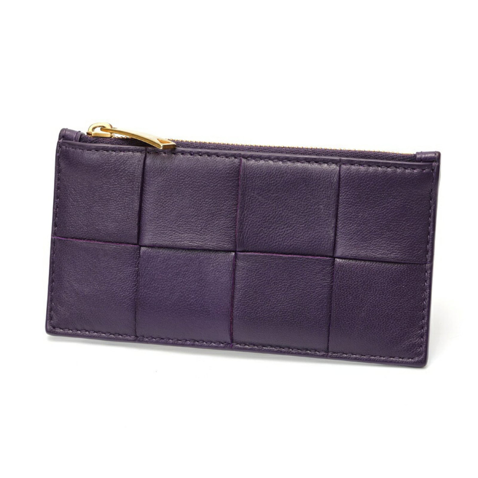 Veneta Card Leather Case: Veneta Card Leather Case The Veneta Card Leather Case is crafted from high-quality calfskin leather, featuring a rich purple hue. Its sleek design and compact size make it a versatile accessory for