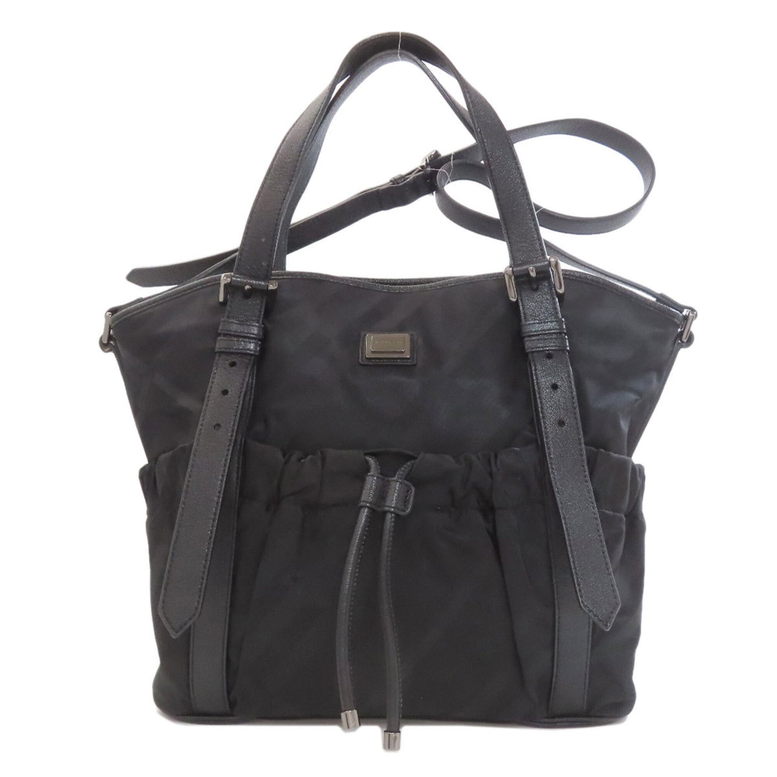 Burberry nylon tote bag: Burberry nylon tote bag Burberry's iconic nylon tote bag boasts a sleek black design and durable construction, featuring a sturdy zipper closure and adjustable straps. Measuring 33cm x 45cm x 9cm,