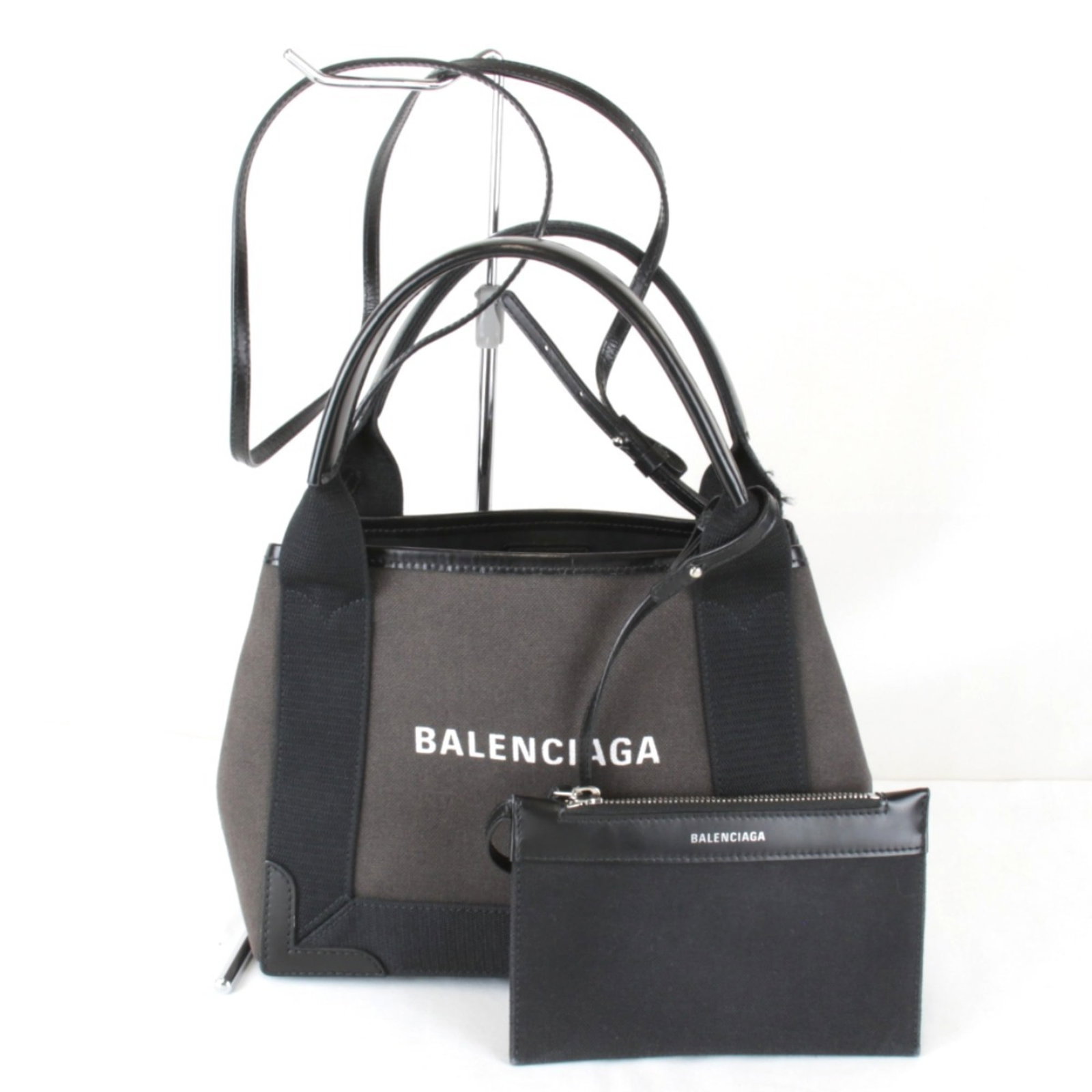Canvas Handbag Balenciaga: Canvas Handbag Balenciaga Canvas Handbag Balenciaga - A sleek and modern black canvas handbag with a signature touch. Measuring 19cm x 28cm x 7cm, this stylish bag features a 36cm handle and 111cm