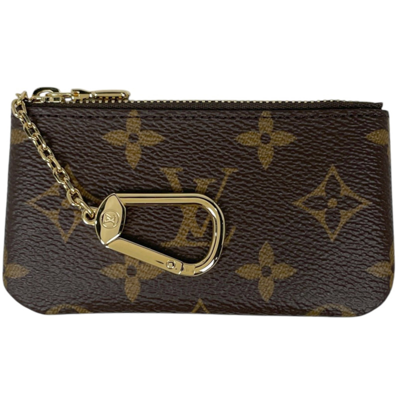 Coin purse Monogram Louis Vuitton: Coin purse Monogram Louis Vuitton Monogrammed with iconic Louis Vuitton design, this brown coin purse boasts a classic, timeless look. Made from high-quality materials, its compact size makes it