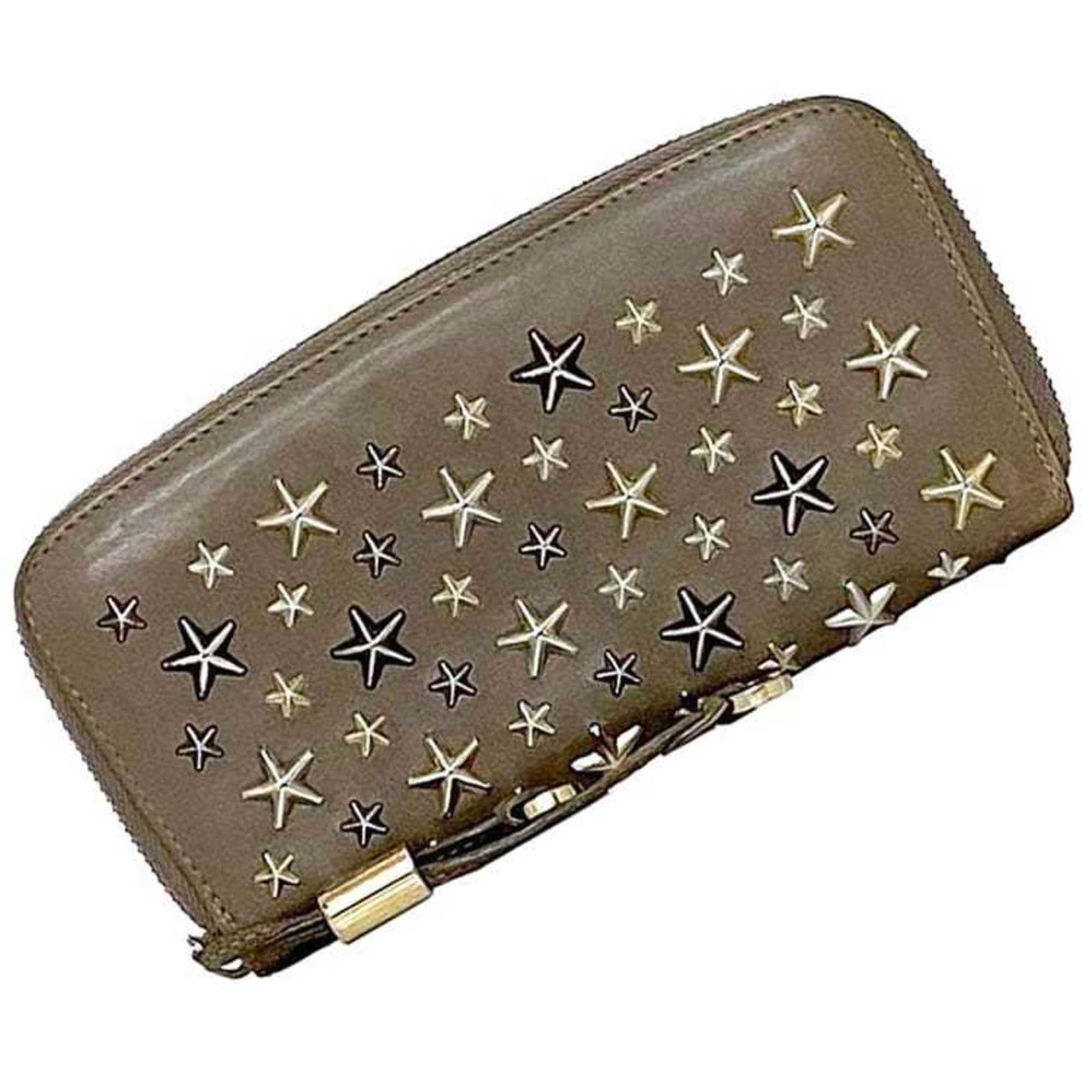 Long Wallet (Bi-Fold) Leather by Jimmy Choo: Long Wallet (Bi-Fold) Leather by Jimmy Choo Leather craftsmanship is evident in this long bi-fold wallet from Jimmy Choo, featuring a classic beige color and clean design. Made from high-quality