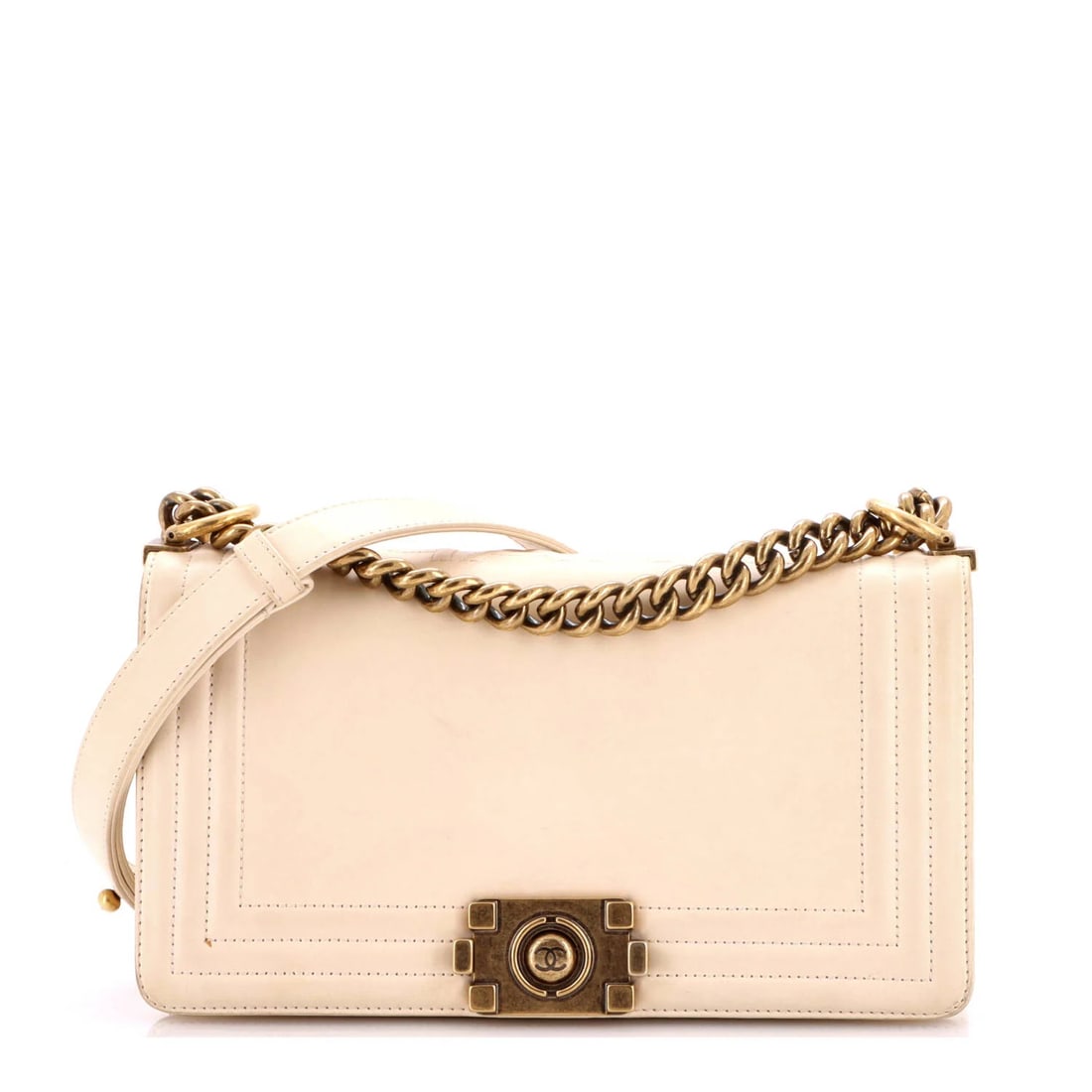 Boy Flap Bag Reverso Chanel Old Calfskin: Boy Flap Bag Reverso Chanel Old Calfskin The Reverso Boy Flap Bag by Chanel features a neutral exterior with a classic design, crafted from high-quality Old Calfskin leather. With its unique flap clos