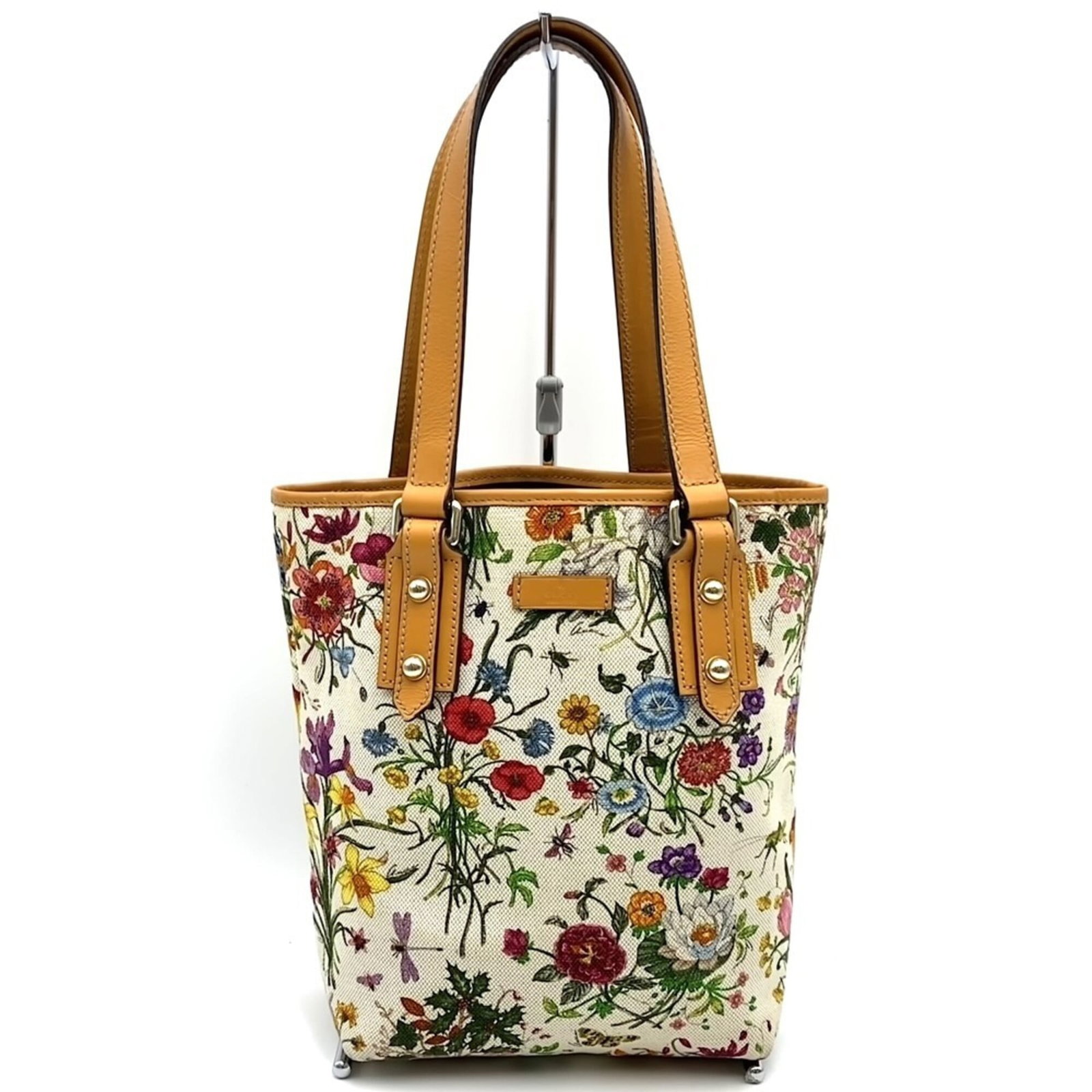 Handbag Tote Bag Canvas Leather Gucci: Handbag Tote Bag Canvas Leather Gucci Canvas and leather Gucci tote bag with distinctive brown and orange color combination, featuring a zipper pocket and open pocket. The bag measures 21cm x 25cm x