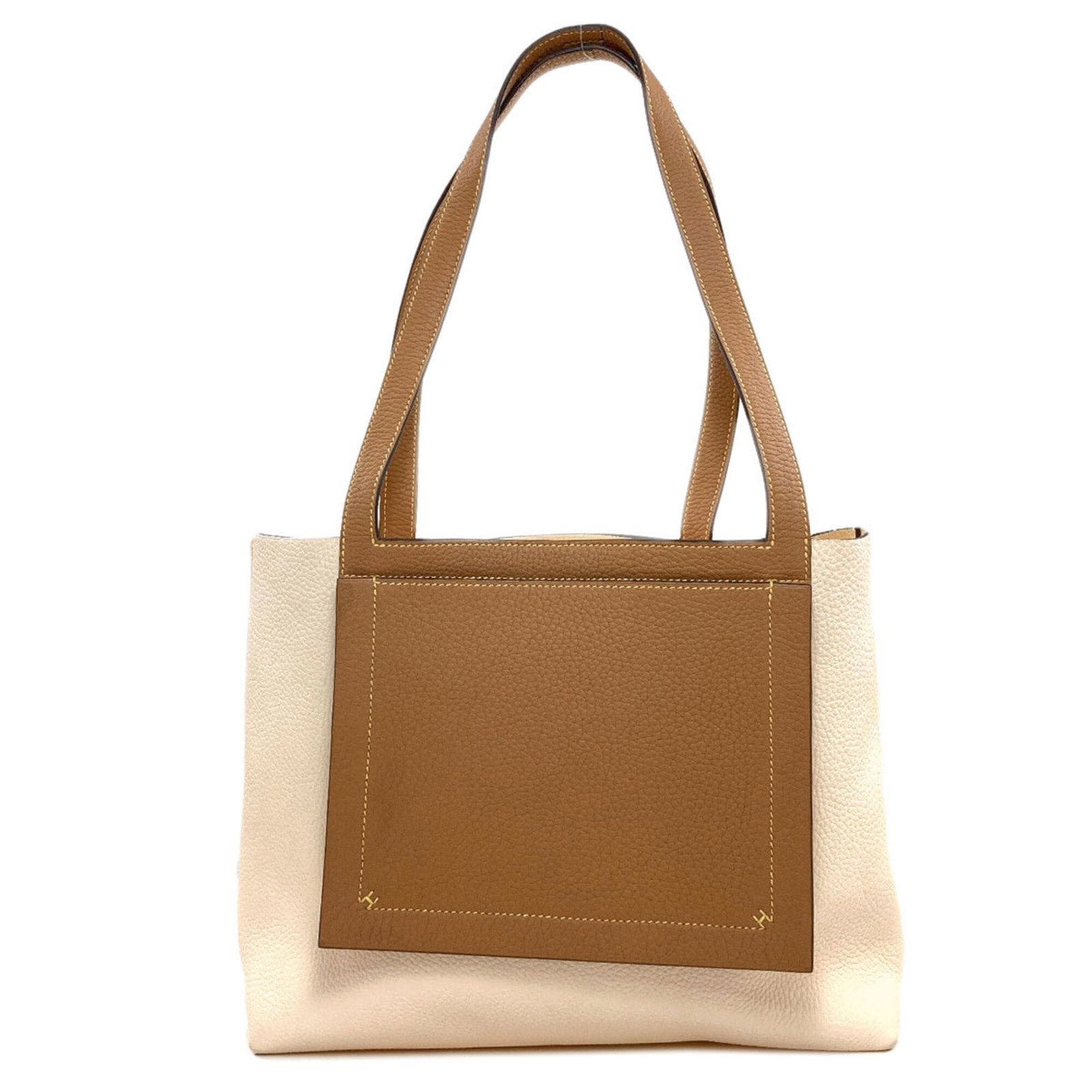 Hermes Tote: Hermes Tote Brown and Ivory Herm?s Tote Bag. This classic tote measures 25cm x 37cm x 10cm and features a 58cm long handle. The timeless design of this iconic Herm?s tote bag makes it a versatile and