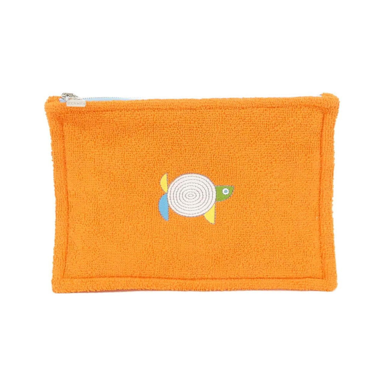 Fabric Pile Pouch Handbag Hermes: Fabric Pile Pouch Handbag Hermes The Fabric Pile Pouch Handbag is a vibrant orange pouch made from pile fabric, featuring silver hardware. Measuring 5.51'' x 8.66'' x 0.39'', this compact handbag is