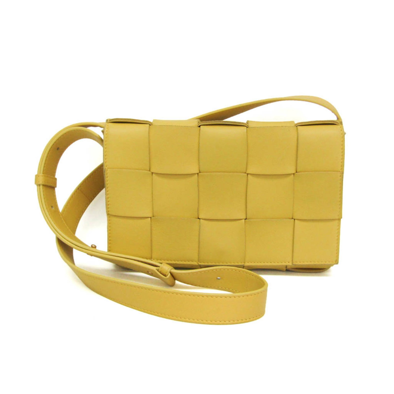 Bottega Veneta Shoulder Bag Leather: Bottega Veneta Shoulder Bag Leather Bottega Veneta's Cassette 578004 shoulder bag is a stylish and functional leather accessory. Made from high-quality lamb leather, this bag features a unique yellow 