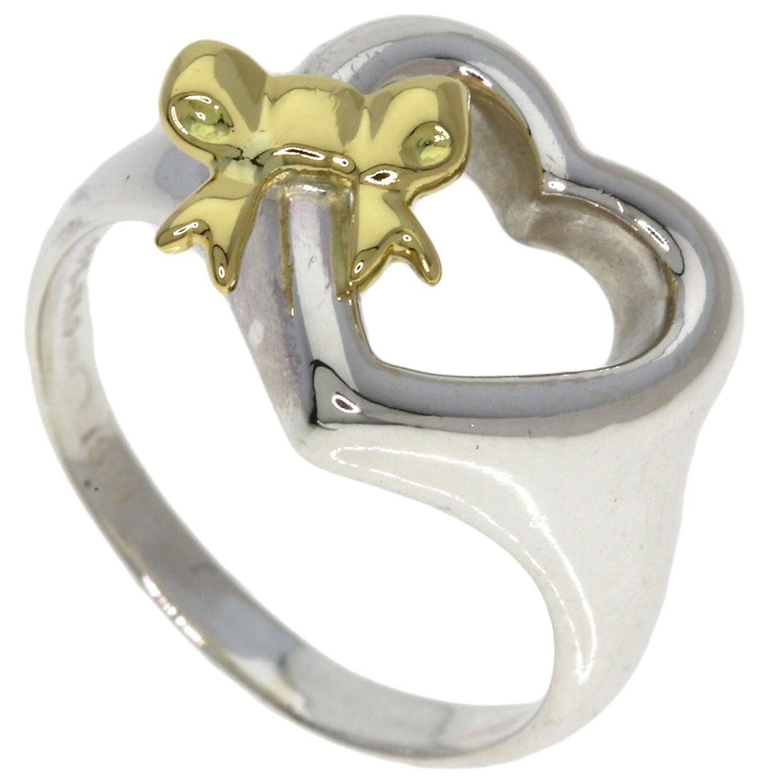Heart Ribbon Ring Silver 18K Yellow Gold Tiffany&Co: Heart Ribbon Ring Silver 18K Yellow Gold Tiffany&Co Silver 18K Yellow Gold Tiffany&Co Ring with a sleek Heart Ribbon design, crafted from high-quality Silver metal, available in a size 5.25(US). This 