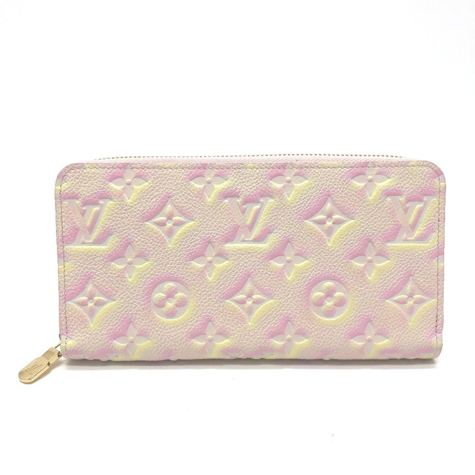 Bi Fold Monogram Empreinte Wallet Louis Vuitton: Bi Fold Monogram Empreinte Wallet Louis Vuitton Monogram Empreinte wallet from Louis Vuitton features a light pink color and a bi-fold design with a zipper closure, perfect for everyday use. The