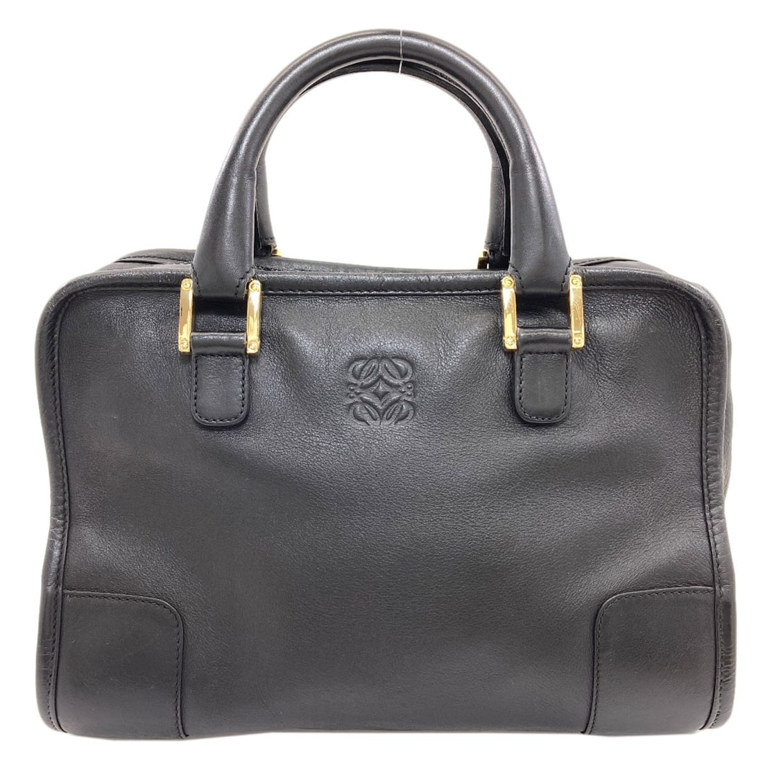 Calf Handbag Loewe Amazona: Calf Handbag Loewe Amazona Calf handbag from LOEWE, featuring a sleek black exterior made from high-quality calf material. The Amazona style showcases a classic design with a timeless appeal. This