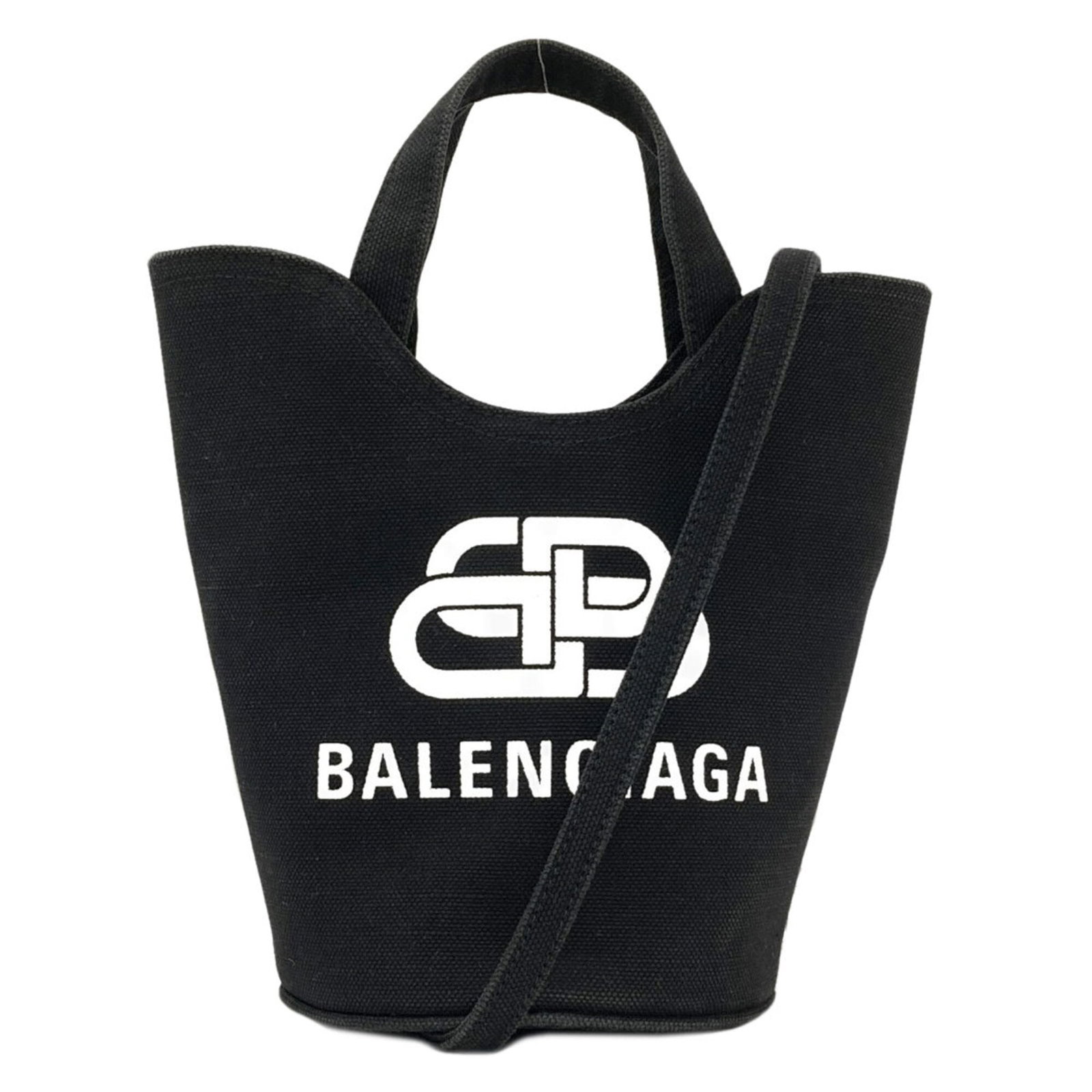 Canvas Handbag Balenciaga: Canvas Handbag Balenciaga Canvas Handbag by Balenciaga, a sleek and modern design featuring a black canvas material, with a signature and a sturdy 22cm handle and adjustable strap length. This