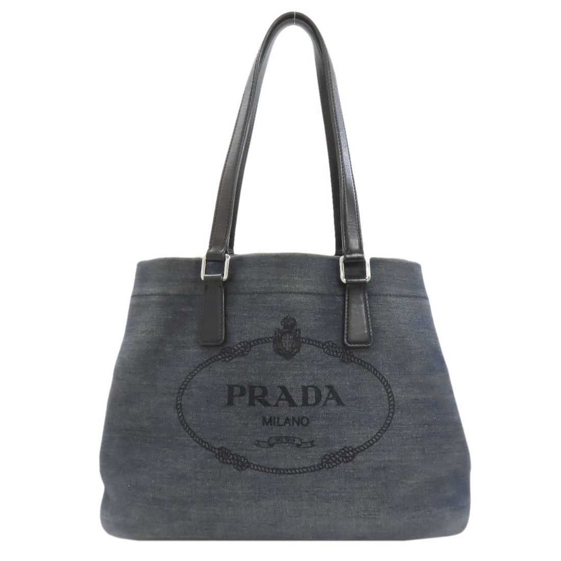 Logo Tote Bag Denim: Logo Tote Bag Denim Blue denim tote bag with a PRADA logo, made from high-quality denim material. The bag features a classic design with a prominent blue color that makes a statement. Item Specifics: 