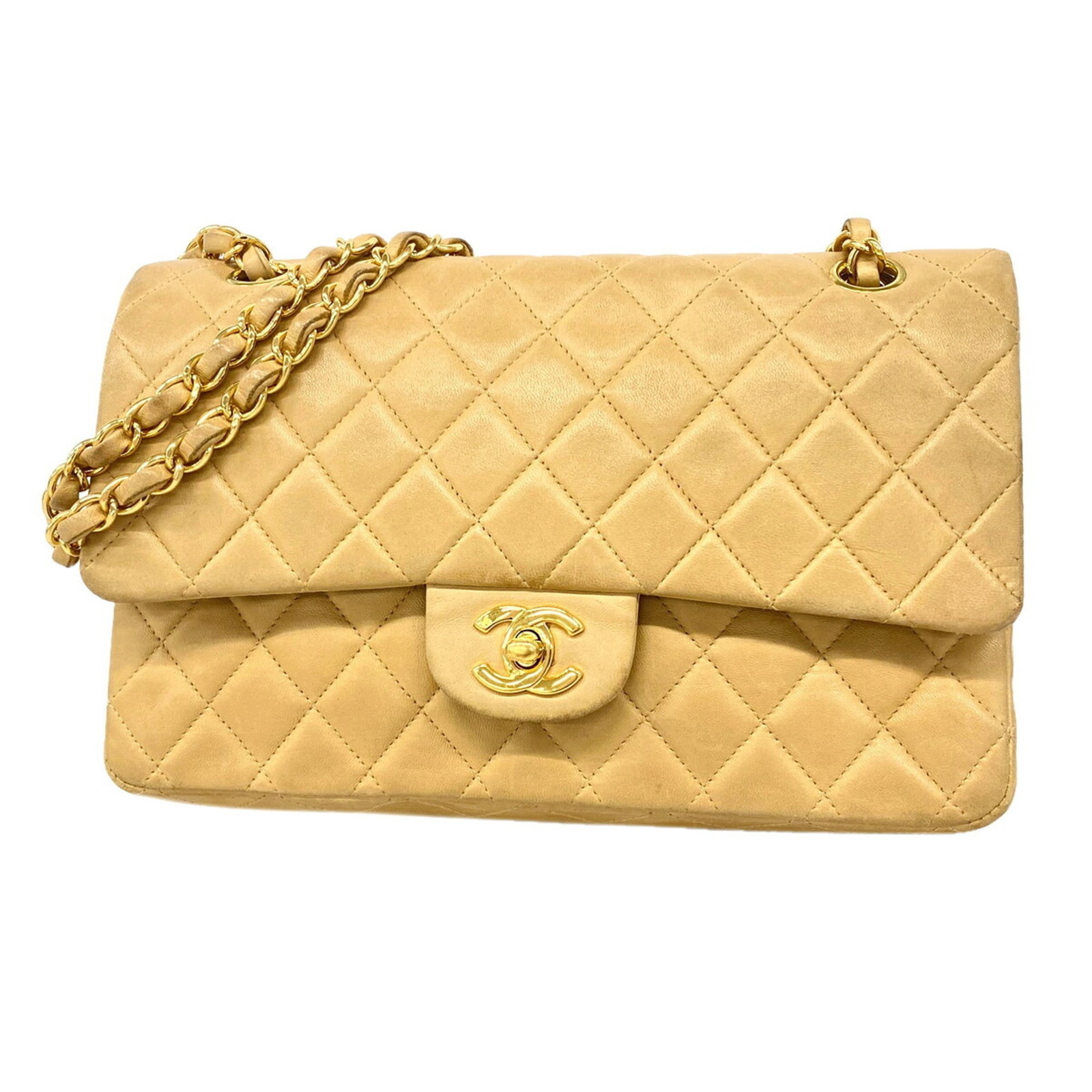 Shoulder Bag Leather Chanel: Shoulder Bag Leather Chanel This exquisite shoulder bag is crafted from luxurious lambskin leather, featuring a timeless beige color and elegant gold hardware. Measuring 15.5cm x 25cm x 6.5cm, it boas