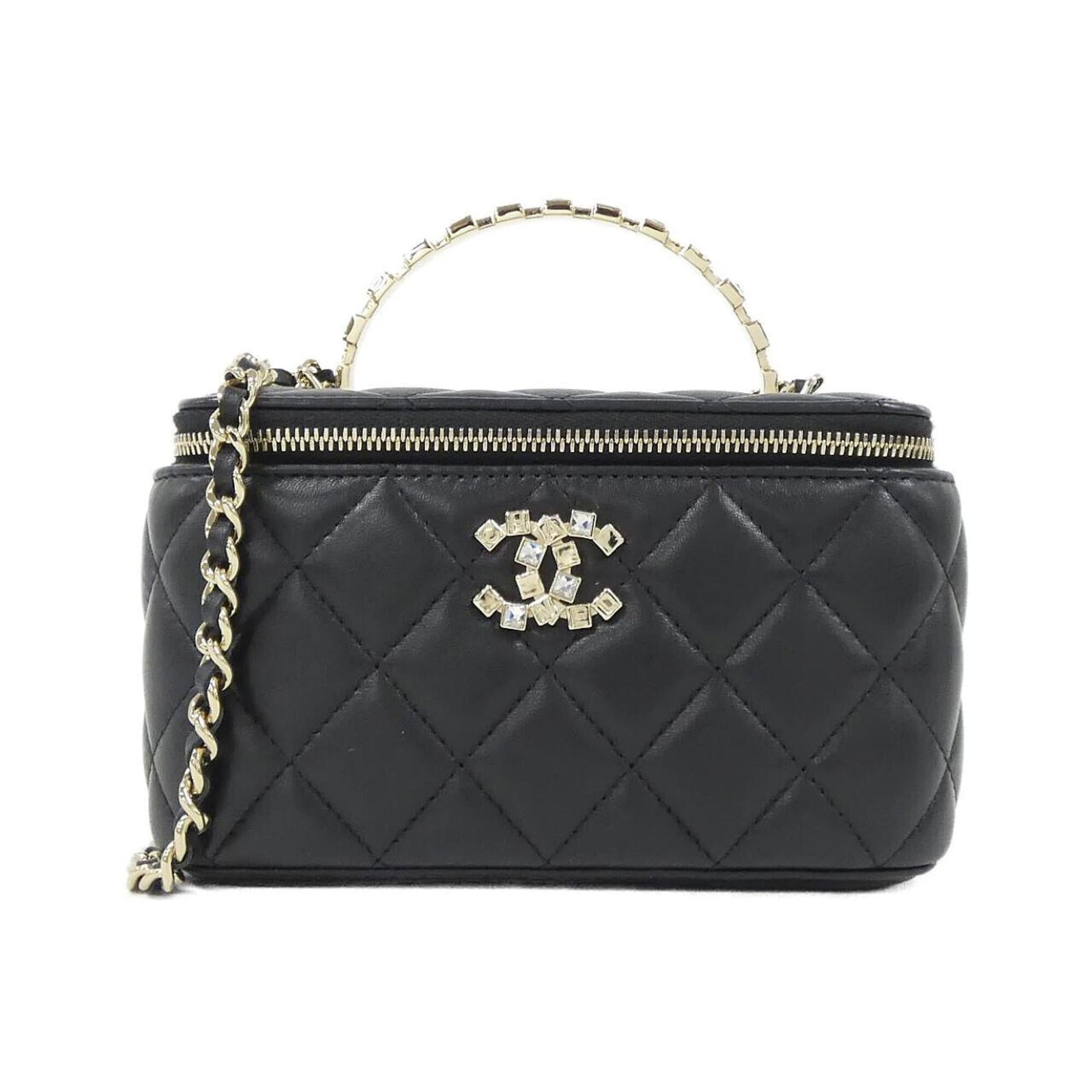 Handbag Leather from Chanel: Handbag Leather from Chanel Black lambskin handbag from Chanel, measuring 10cm x 16cm x 9cm. This luxurious leather handbag is crafted from high-quality lambskin, showcasing a sleek and sophisticated