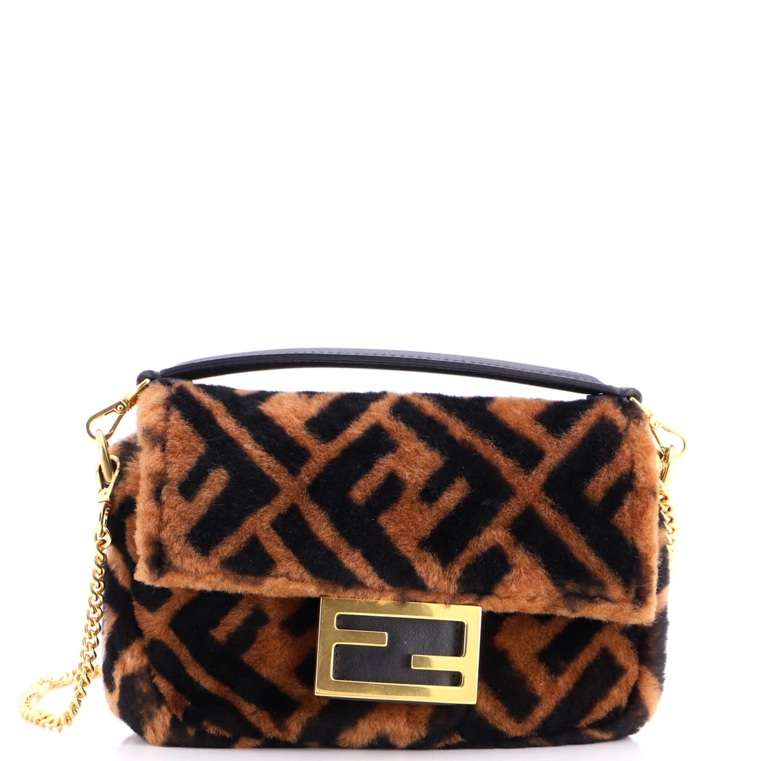 Baguette Shearling Mini Fendi Zucca Bag: Baguette Shearling Mini Fendi Zucca Bag Shearling trim adds a luxurious touch to this Brown Mini Fendi Zucca Bag, featuring a cross body design and gold hardware. With its rich, brown exterior and bla