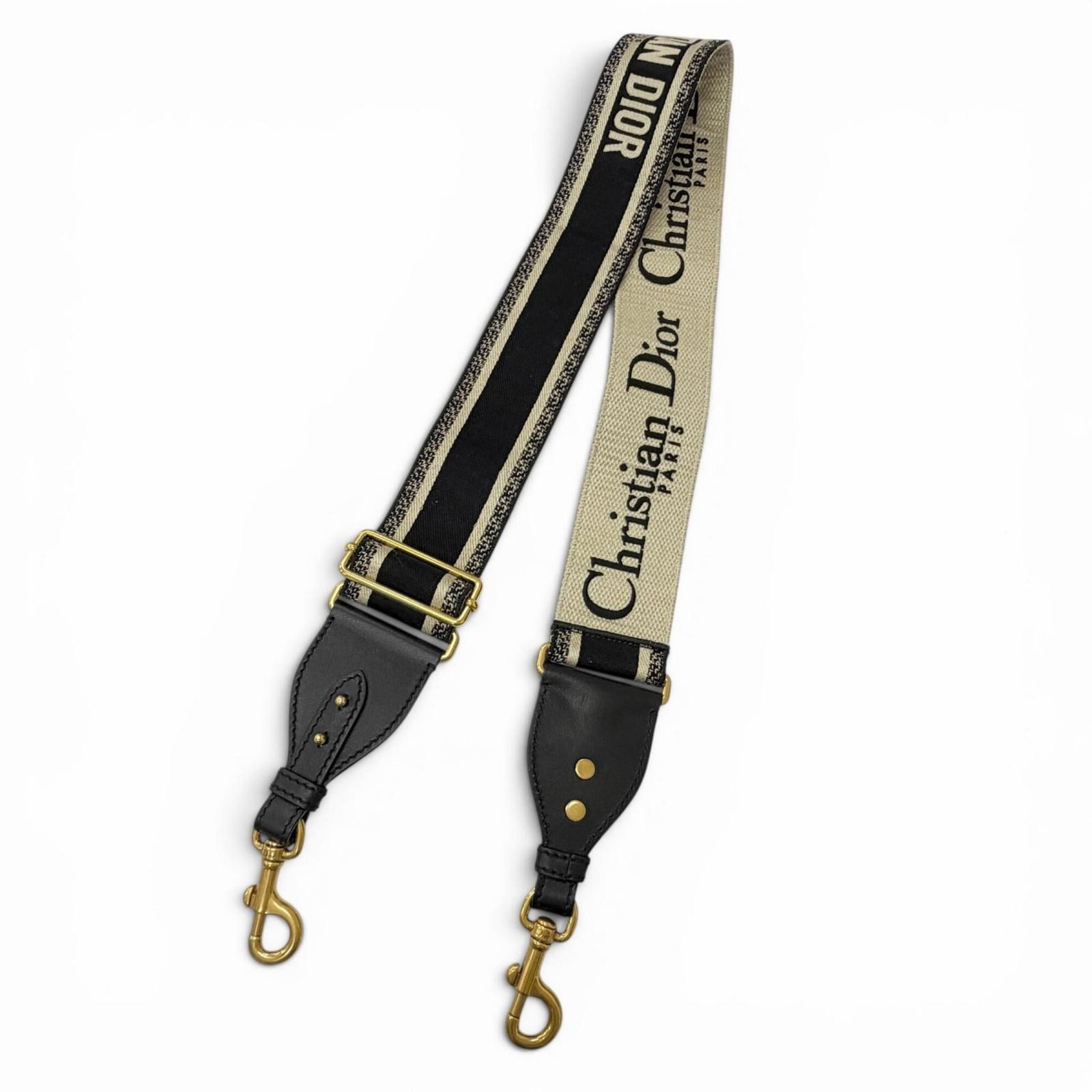 Strap Leather Christian Dior: Strap Leather Christian Dior Strap Leather Christian Dior is made from high-quality leather and features a classic design. The beige and black color options provide a versatile look, while the 123cm l