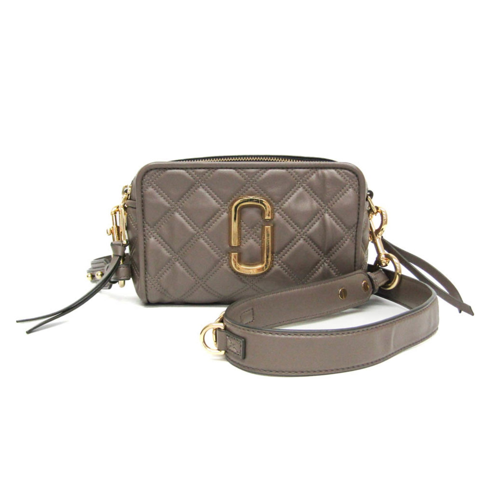 Leather Shoulder Bag by Marc Jacobs: Leather Shoulder Bag by Marc Jacobs The Marc Jacobs Leather Shoulder Bag features a quilted design, gray beige color, and a zipper closure. With a card holder and open pocket, this bag provides practi