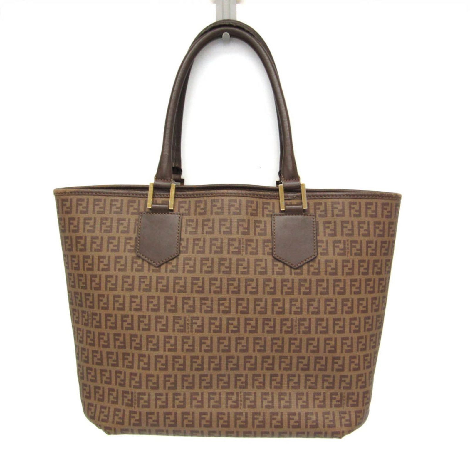 Leather Tote Fendi Bag: Leather Tote Fendi Bag This luxurious Fendi Zucchino tote bag is crafted from high-quality leather and features a rich brown and light brown color combination. With its spacious interior, including a 
