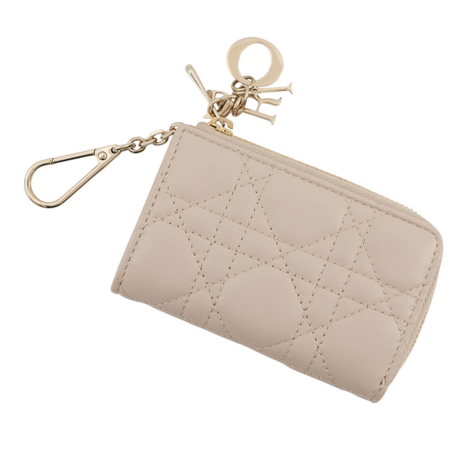 Keycase Leather by Christian Dior: Keycase Leather by Christian Dior Keycase Leather by Christian Dior is a stylish accessory made from lambskin leather. Measuring 7cm x 11cm, it features a sleek design that fits neatly in a purse or b