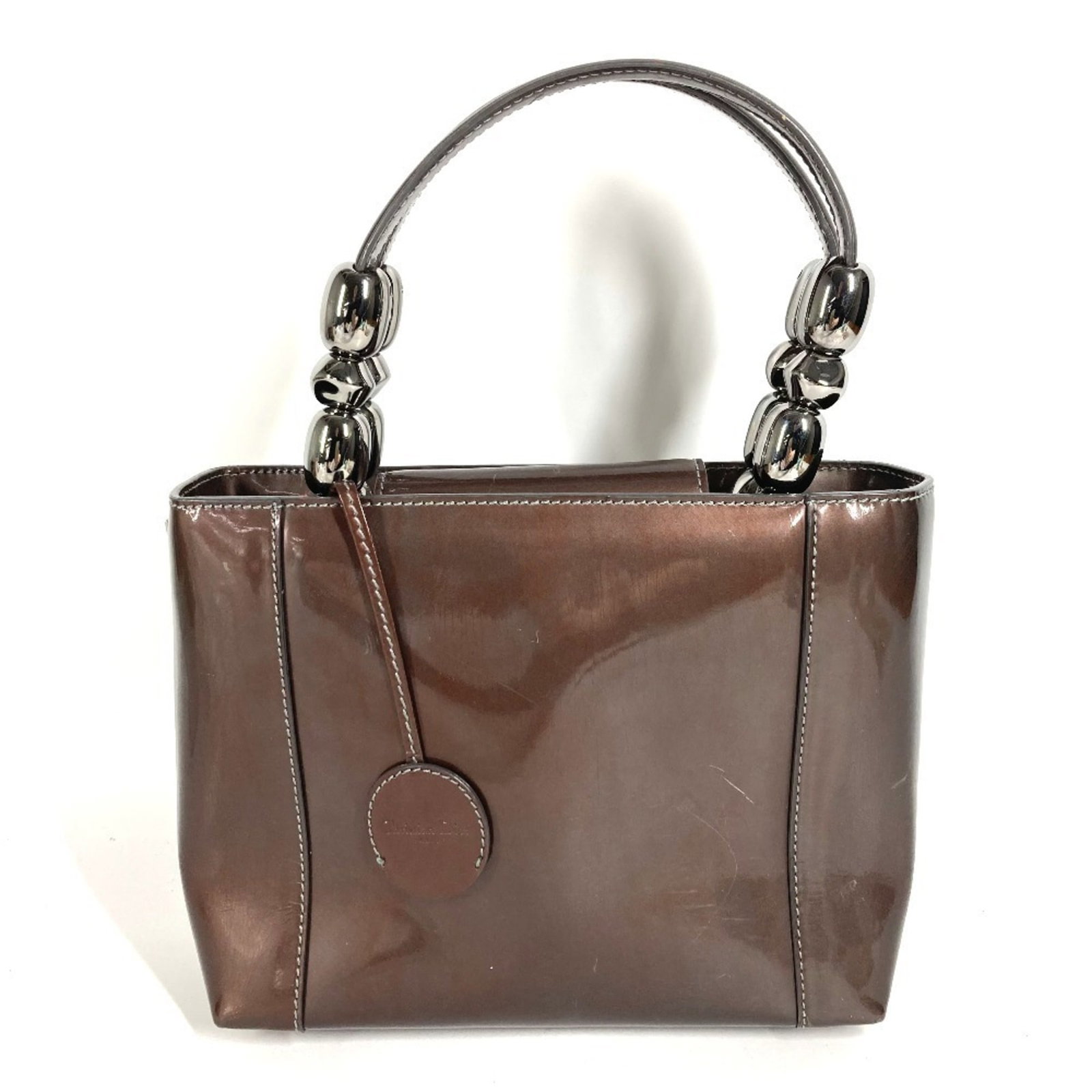 Handbag Patent Leather By Christian Dior: Handbag Patent Leather By Christian Dior Patent leather by Christian Dior, a timeless and sophisticated handbag. Made from high-quality patent leather, this classic design features a sleek, brown