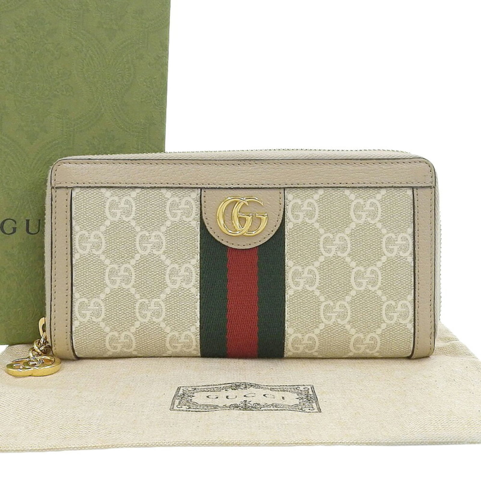 Gg Supreme Gg Bi Fold Wallet: Gg Supreme Gg Bi Fold Wallet The Gucci GG Supreme Bi-Fold Wallet boasts a sleek design with a classic beige color, perfectly complemented by the iconic GG Supreme pattern. This stylish wallet