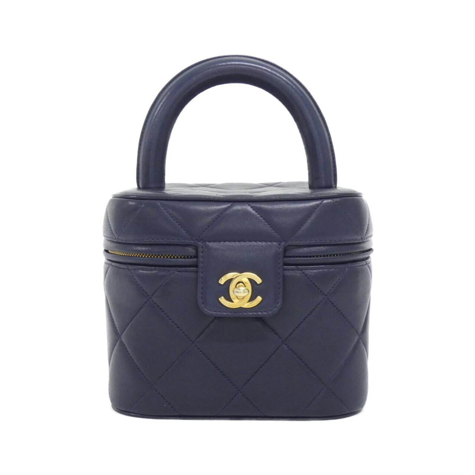 Handbag Leather from Chanel: Handbag Leather from Chanel Navy lambskin handbag from Chanel, featuring high-quality leather construction with a classic design. This stylish accessory measures 15cm x 16.5cm x 16.5cm, making it a